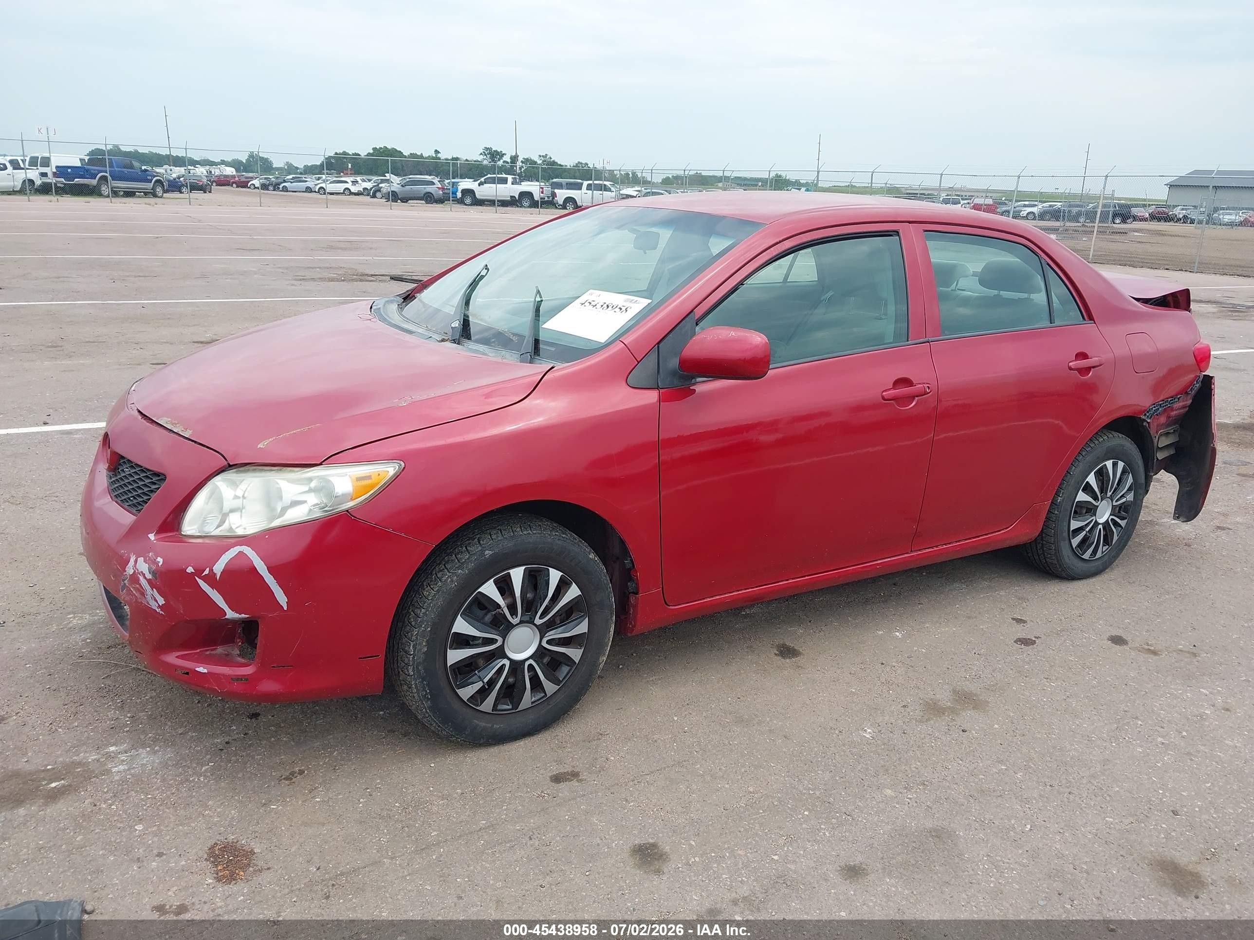 2009 Toyota Corolla Le Red vin: 1NXBU40E09Z036191