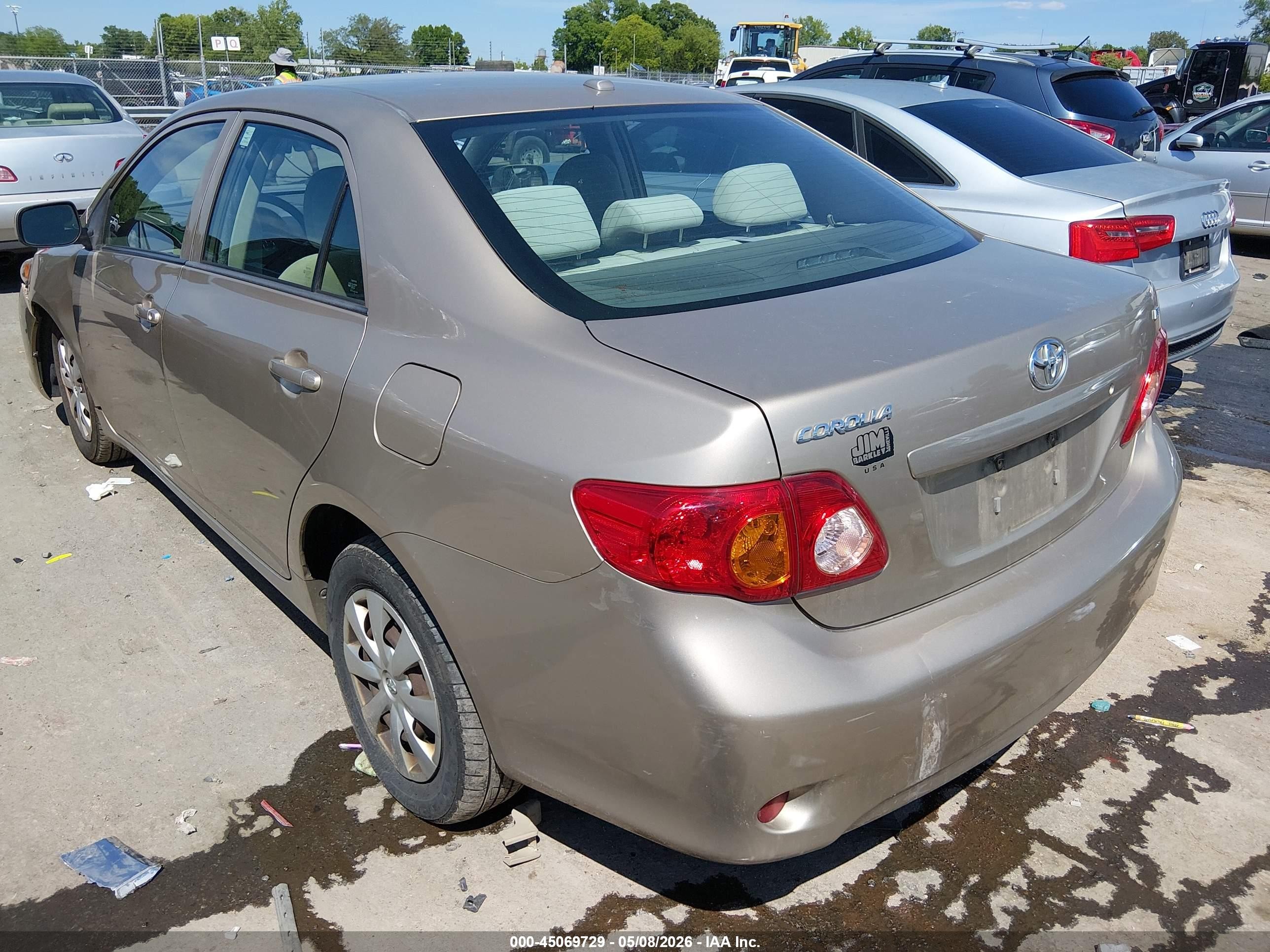 2009 Toyota Corolla Le Brown vin: 1NXBU40E09Z122066