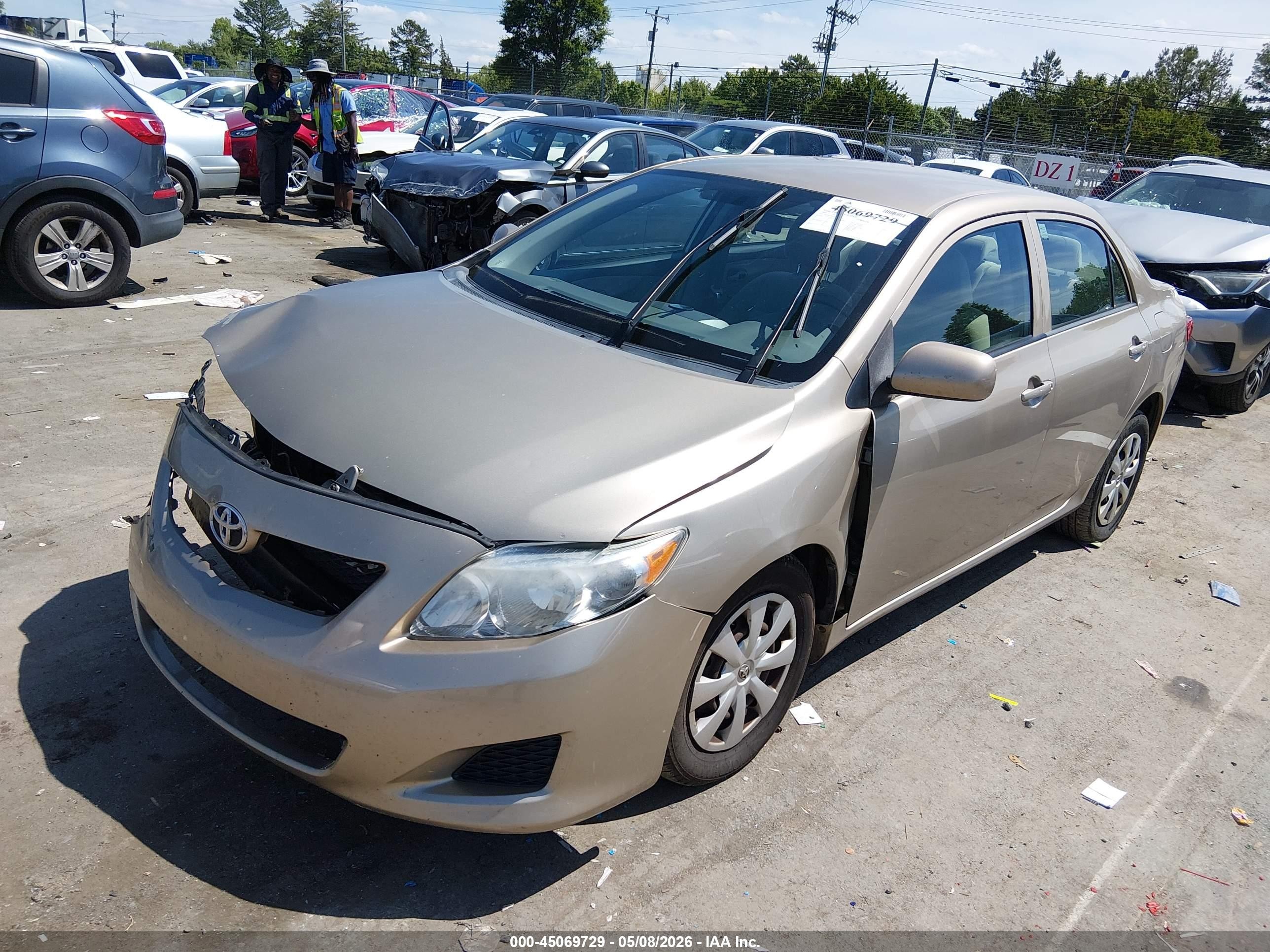 2009 Toyota Corolla Le Brown vin: 1NXBU40E09Z122066