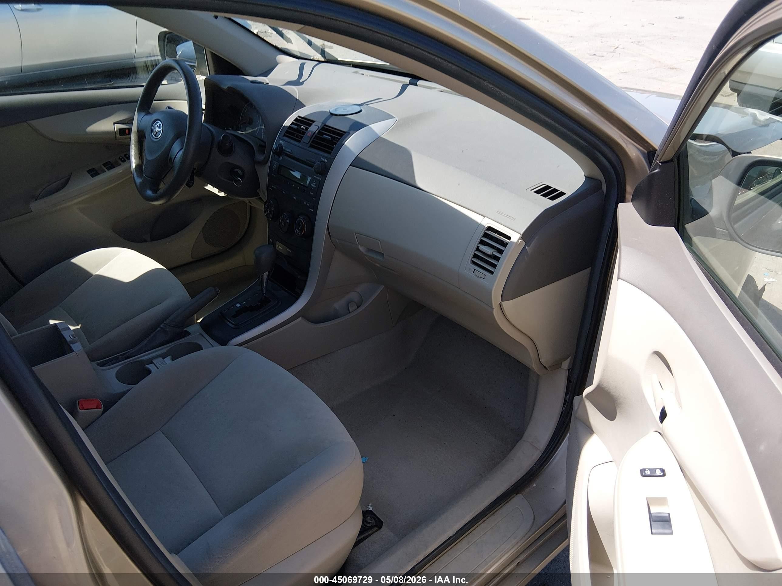2009 Toyota Corolla Le Brown vin: 1NXBU40E09Z122066