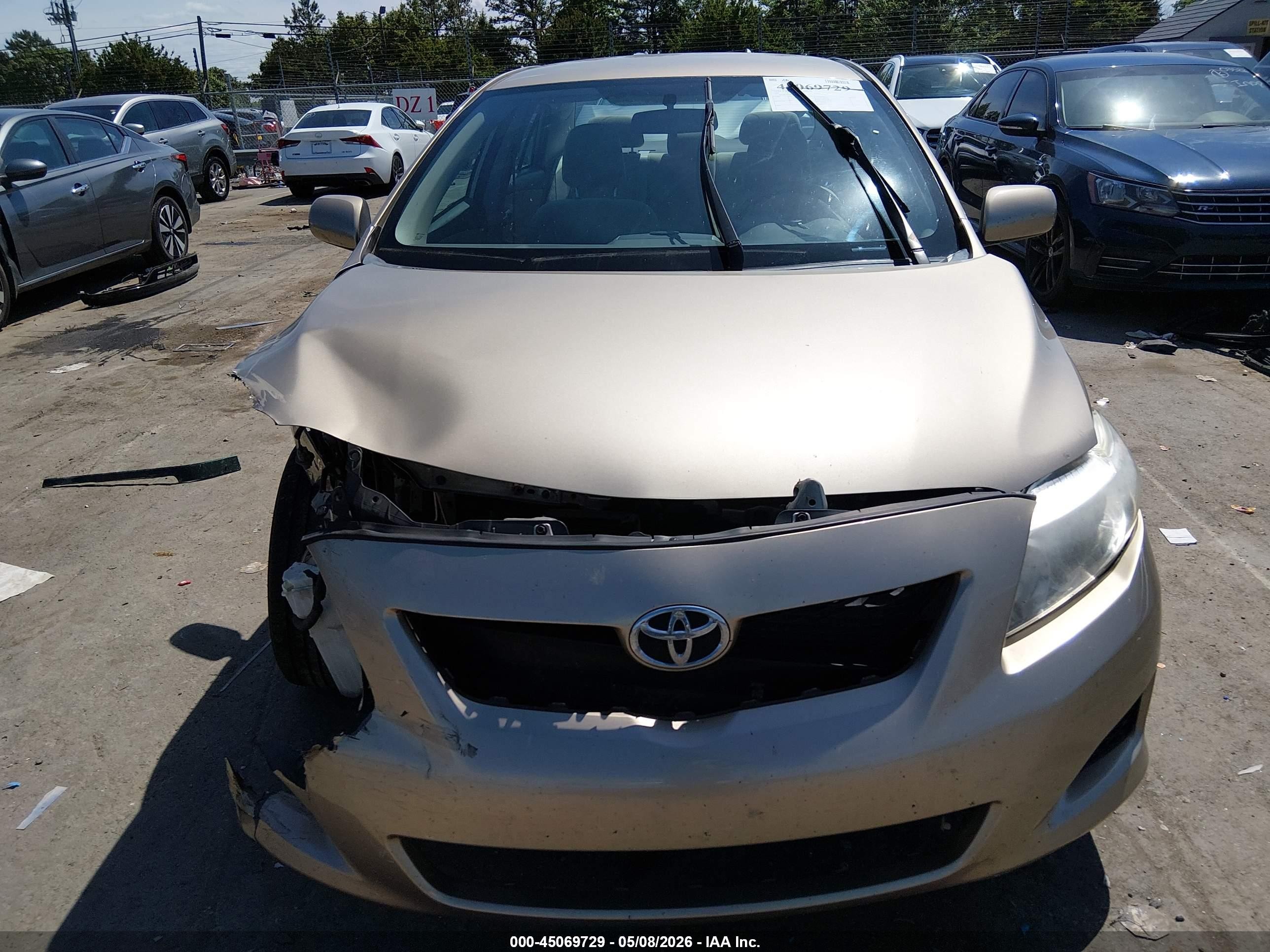 2009 Toyota Corolla Le Brown vin: 1NXBU40E09Z122066