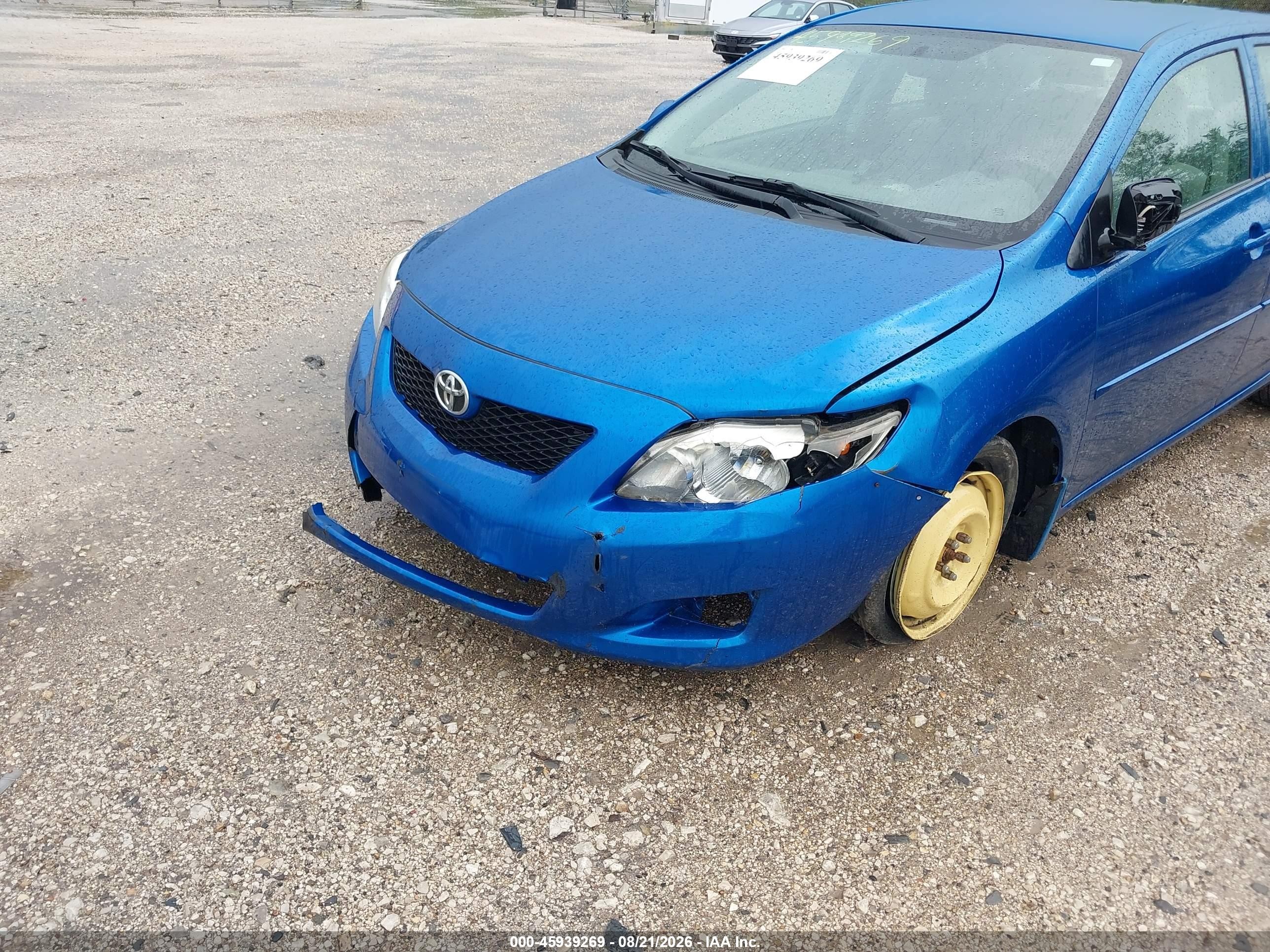 2009 Toyota Corolla   Blue vin: 1NXBU40E09Z149428