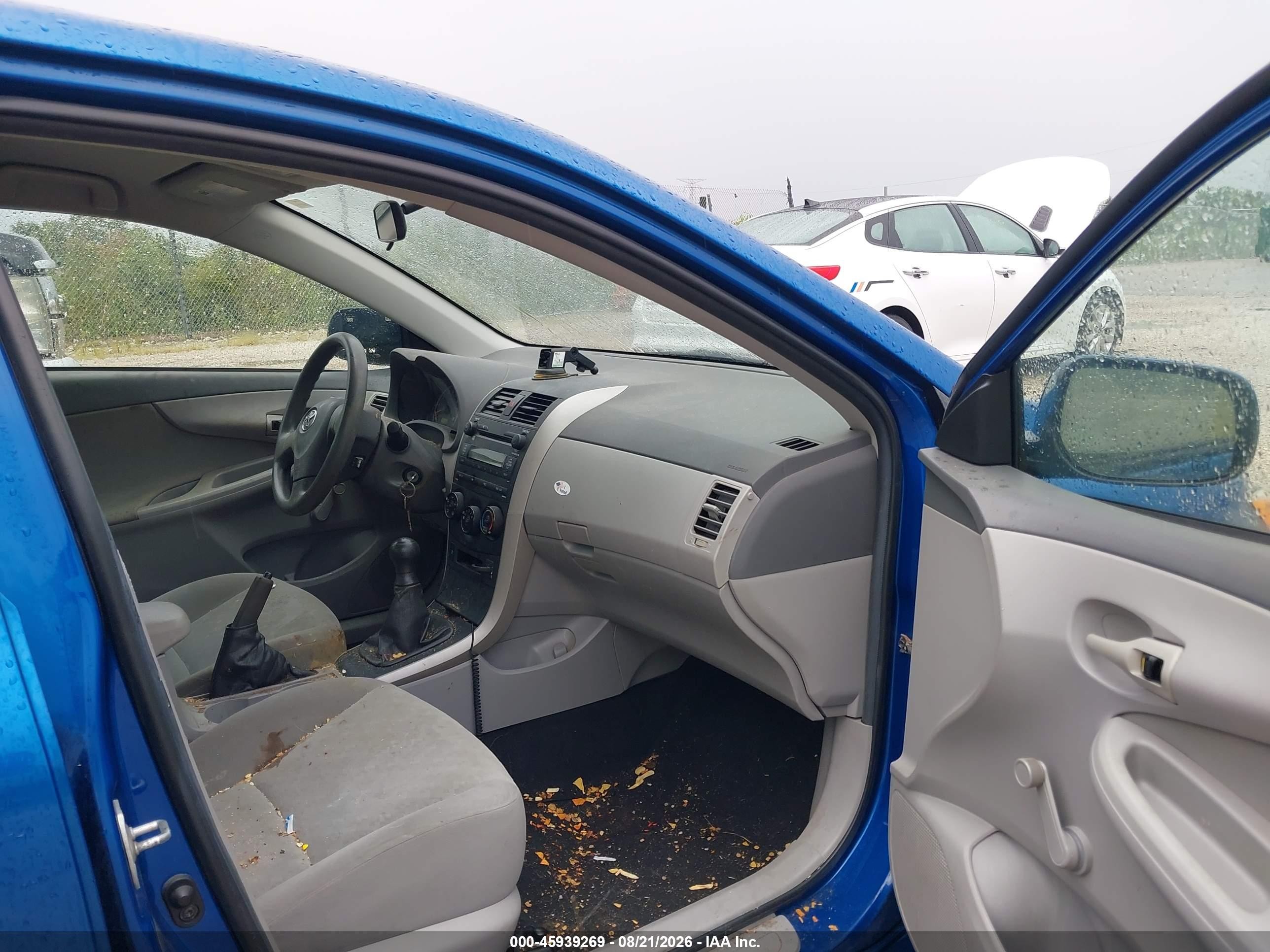 2009 Toyota Corolla   Blue vin: 1NXBU40E09Z149428