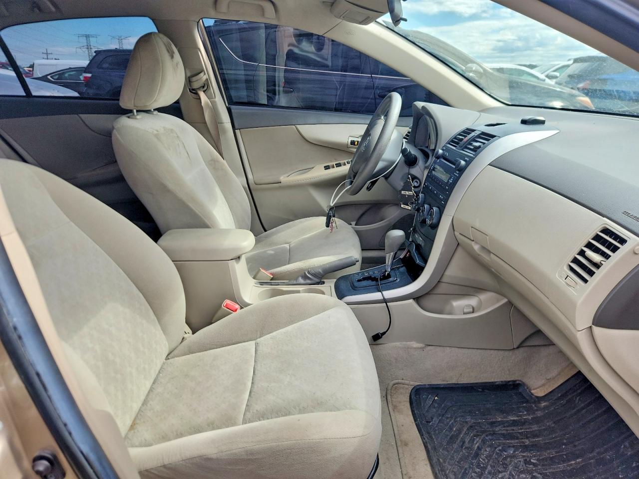 2009 Toyota Corolla Le Tan vin: 1NXBU40E19Z089529
