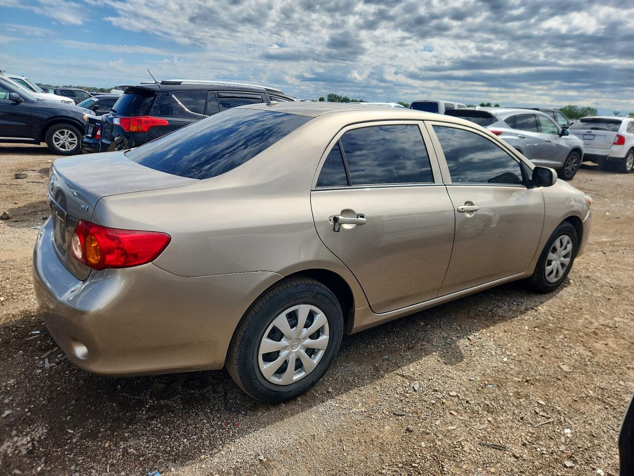 2009 Toyota Corolla Le Tan vin: 1NXBU40E19Z089529