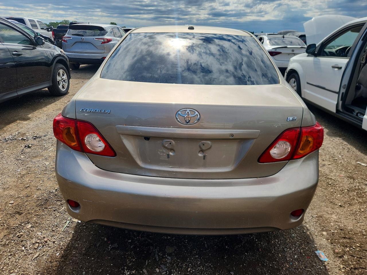 2009 Toyota Corolla Le Tan vin: 1NXBU40E19Z089529
