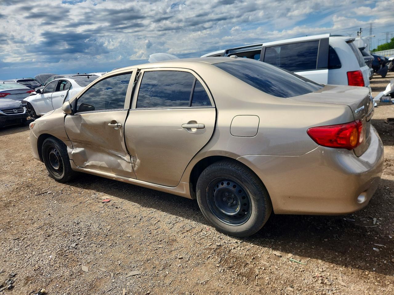 2009 Toyota Corolla Le Tan vin: 1NXBU40E19Z089529