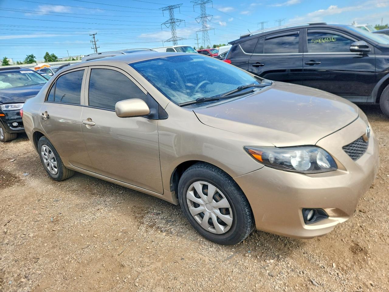 2009 Toyota Corolla Le Tan vin: 1NXBU40E19Z089529