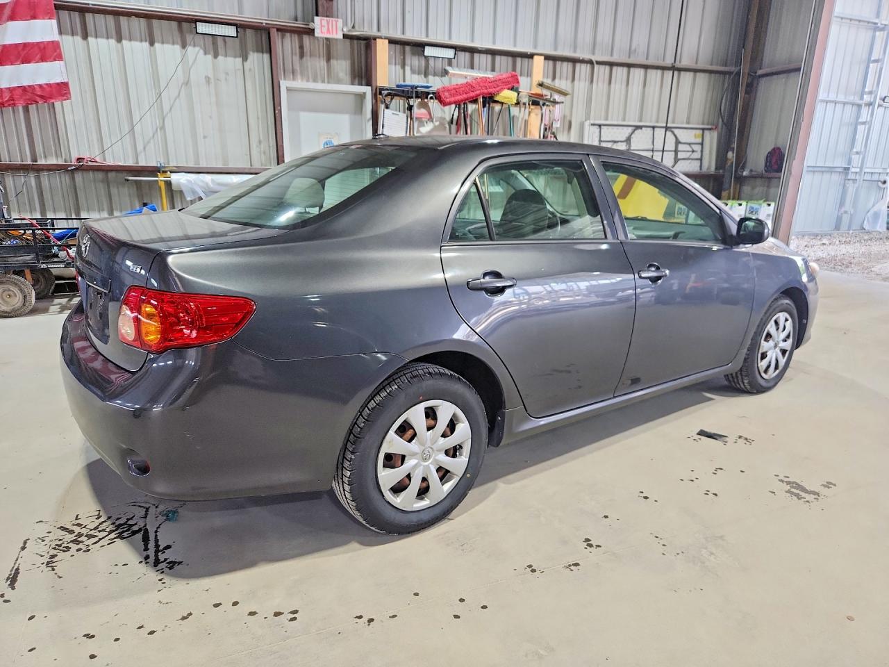 2009 Toyota Corolla Le Charcoal vin: 1NXBU40E19Z123727