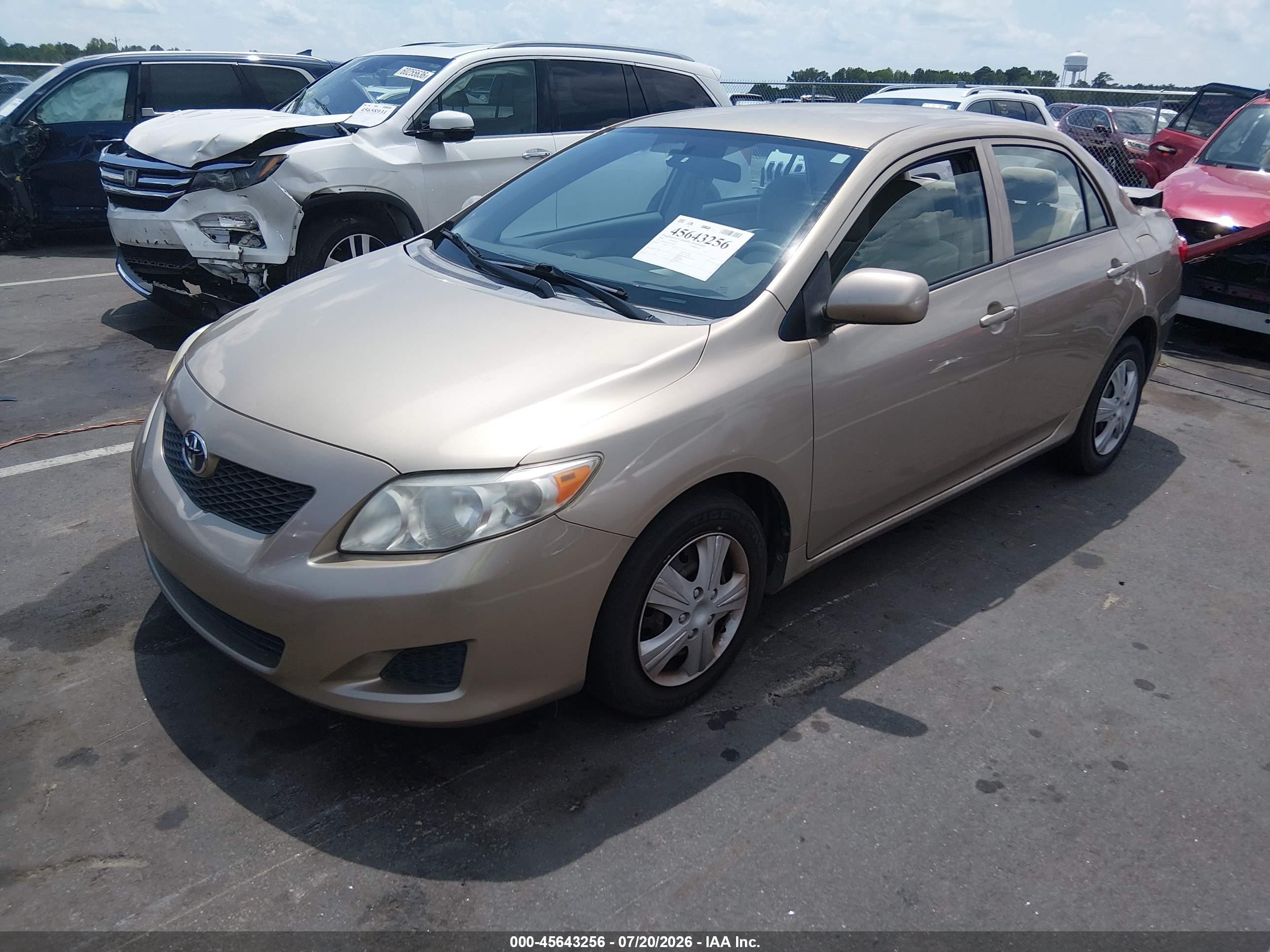 2009 Toyota Corolla Le Золотой vin: 1NXBU40E19Z137997