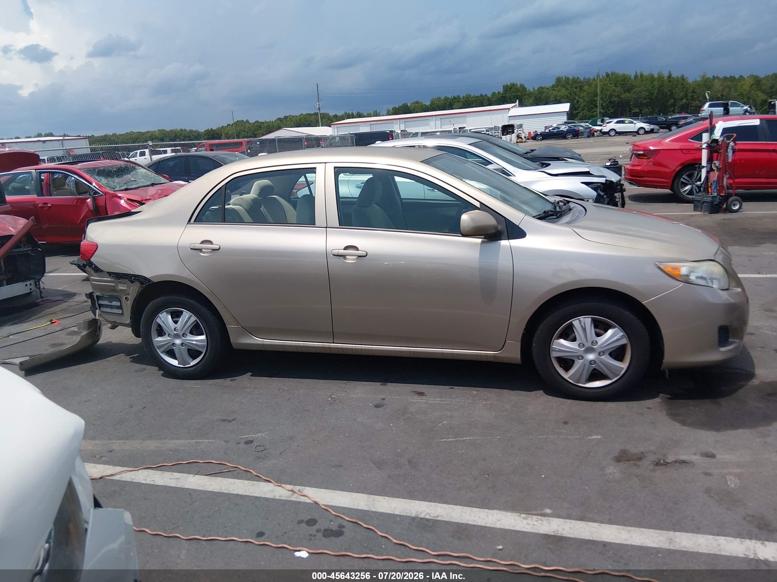 2009 Toyota Corolla Le Золотой vin: 1NXBU40E19Z137997