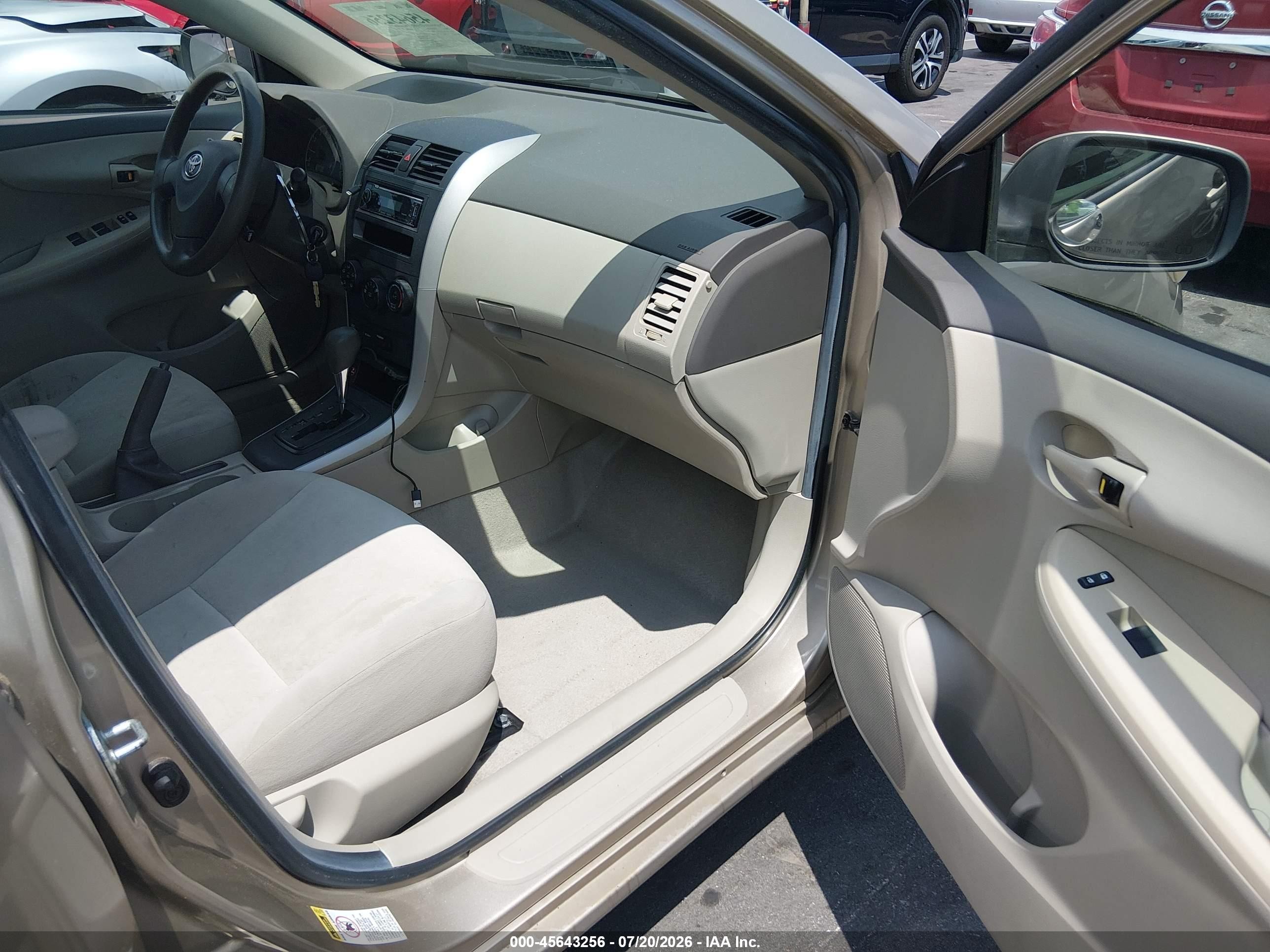 2009 Toyota Corolla Le Золотой vin: 1NXBU40E19Z137997