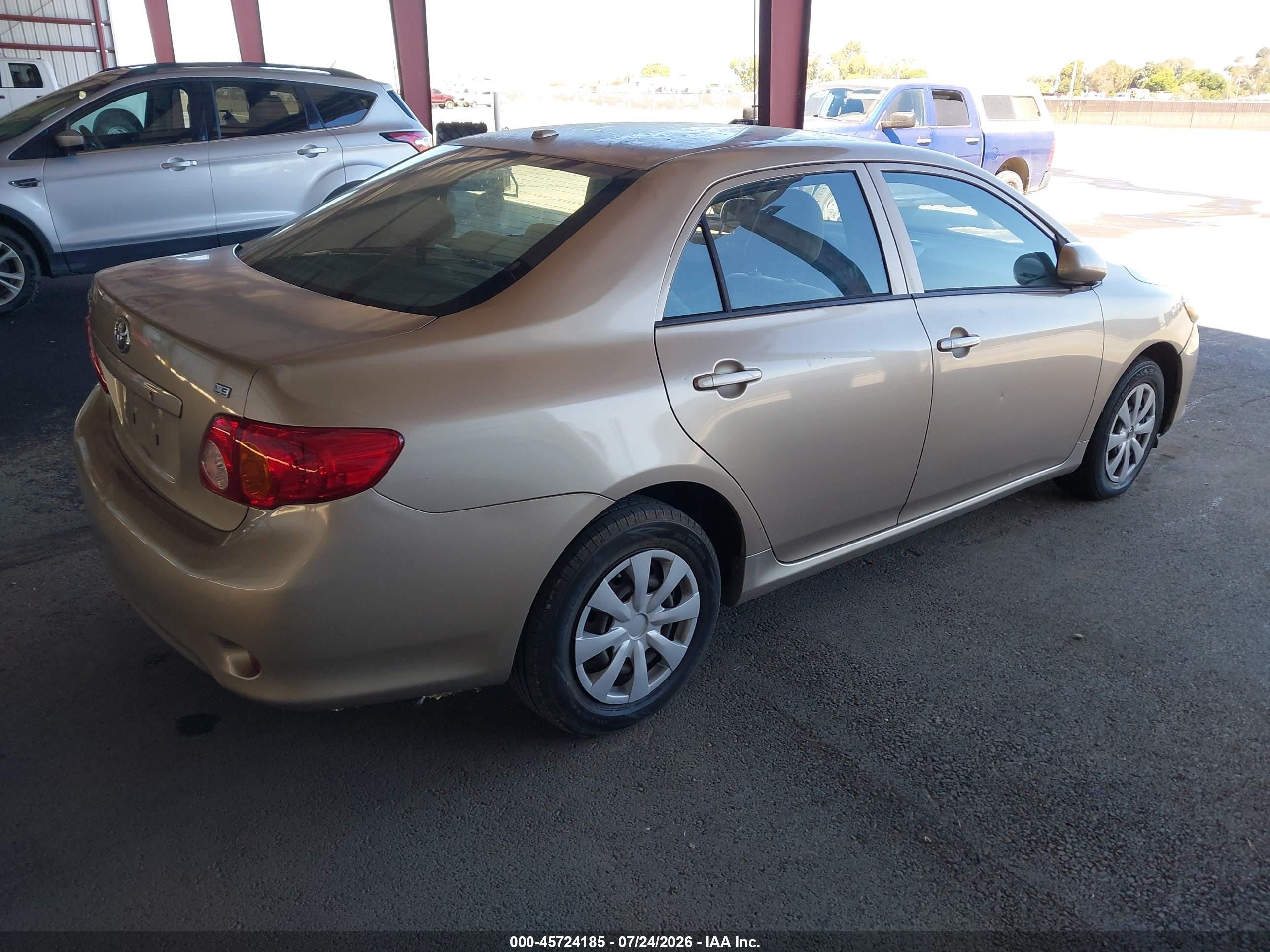 2009 Toyota Corolla Le Золотой vin: 1NXBU40E29Z024754