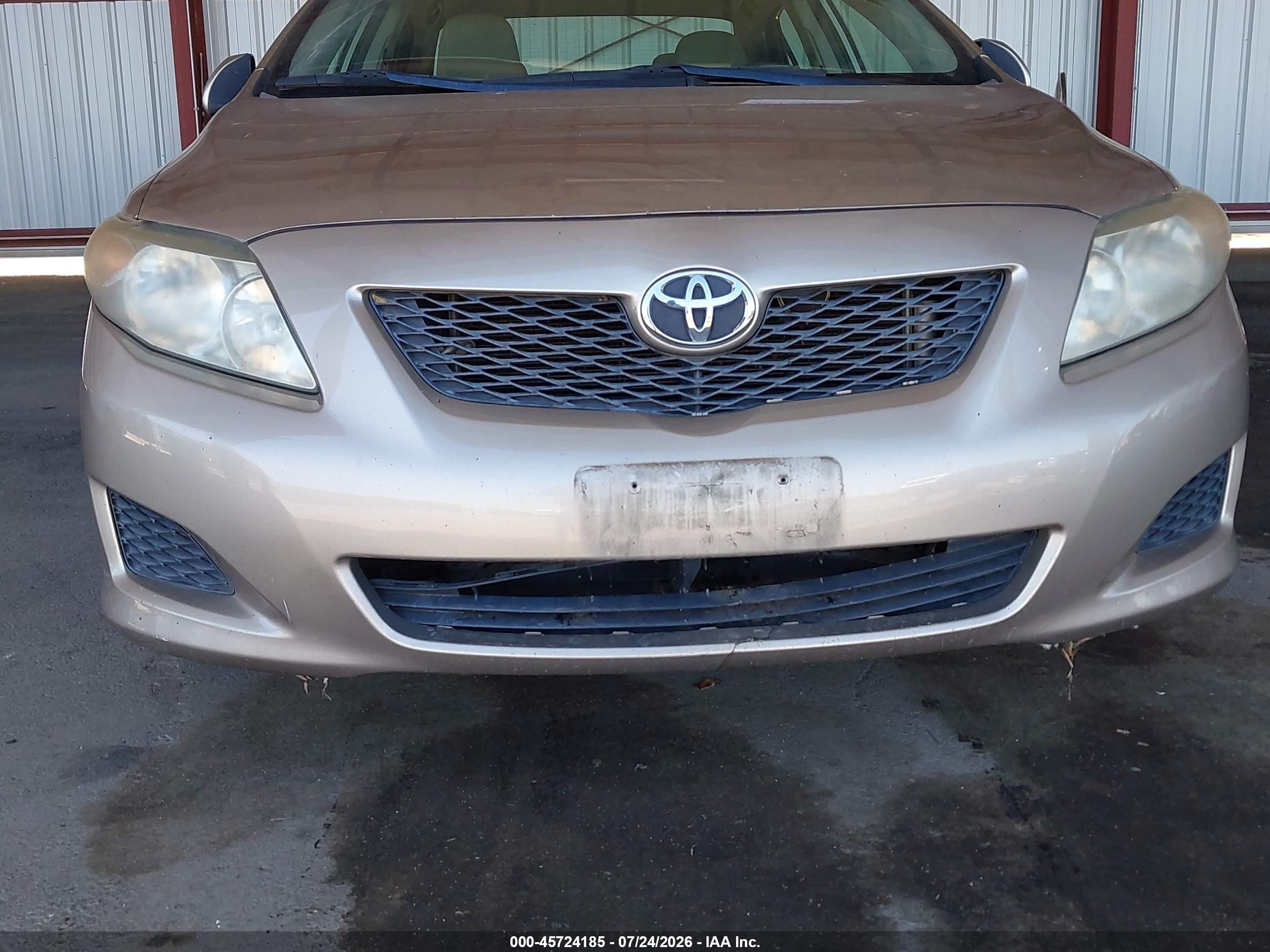 2009 Toyota Corolla Le Золотой vin: 1NXBU40E29Z024754