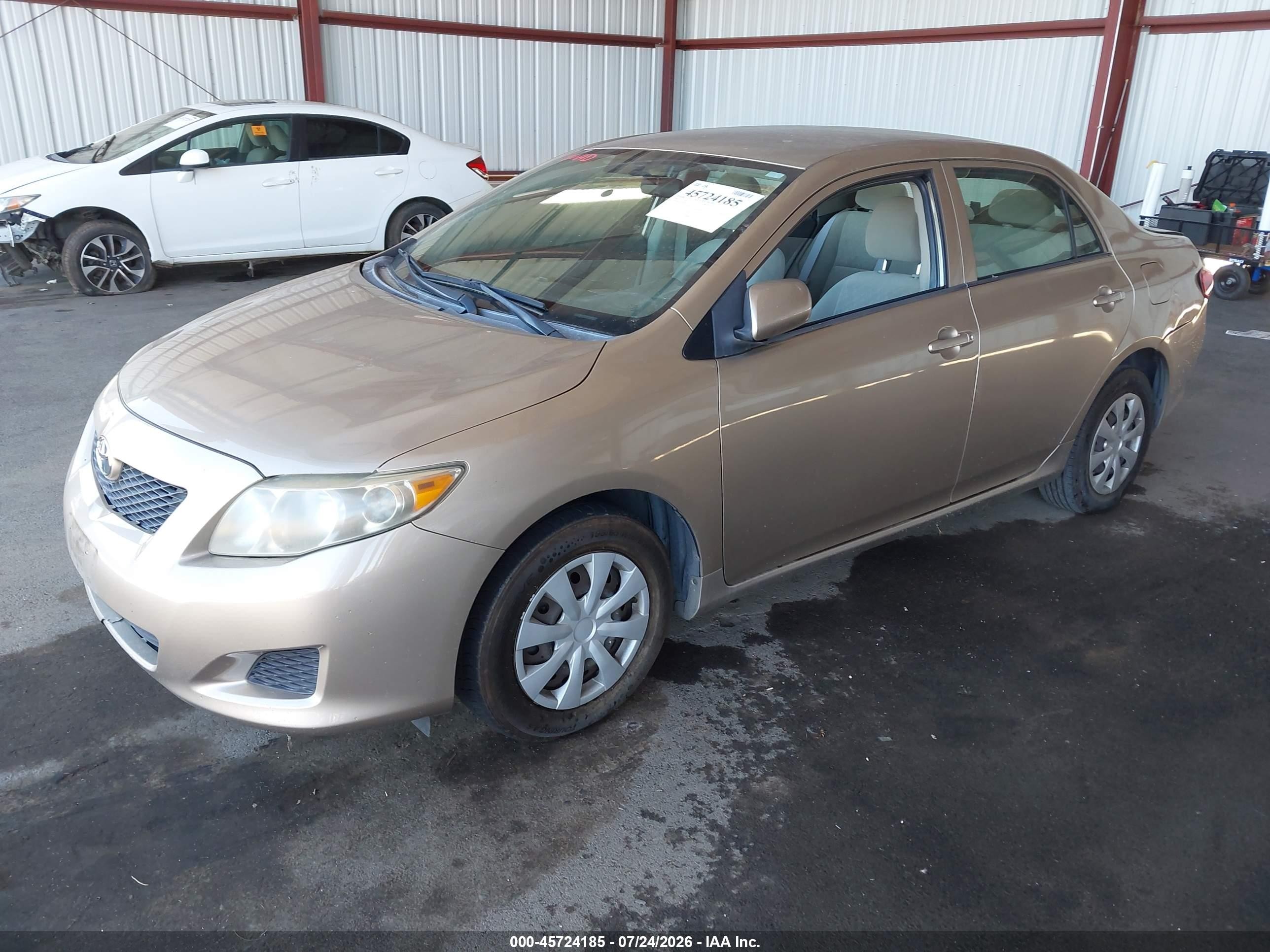 2009 Toyota Corolla Le Золотой vin: 1NXBU40E29Z024754