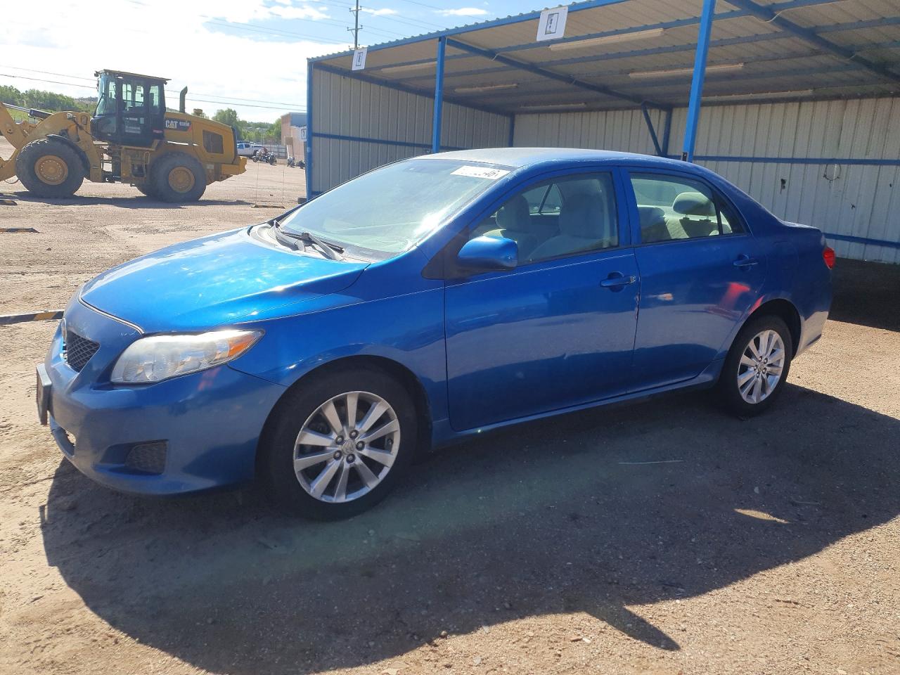 2009 Toyota Corolla Le Blue vin: 1NXBU40E29Z037990