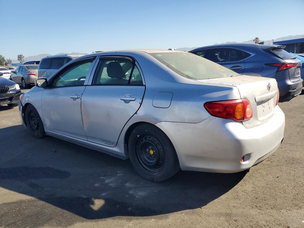 2009 Toyota Corolla Le Silver vin: 1NXBU40E29Z043160