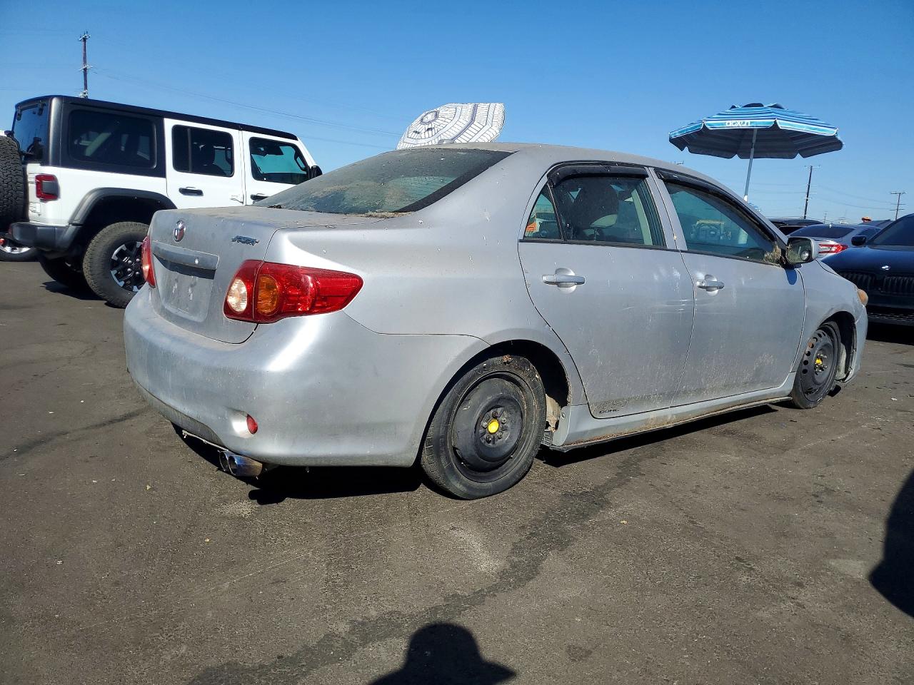 2009 Toyota Corolla Le Silver vin: 1NXBU40E29Z043160
