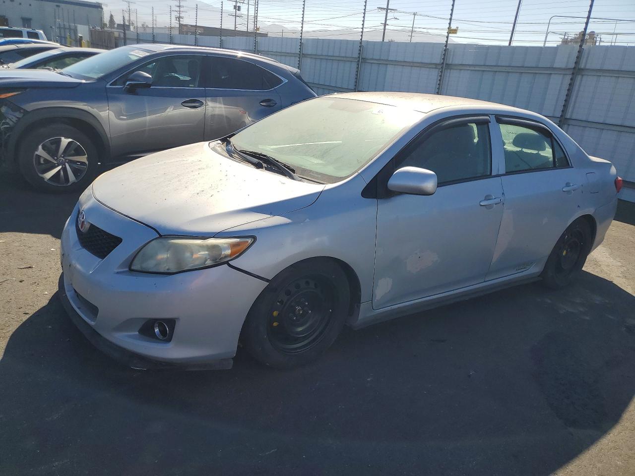 2009 Toyota Corolla Le Silver vin: 1NXBU40E29Z043160