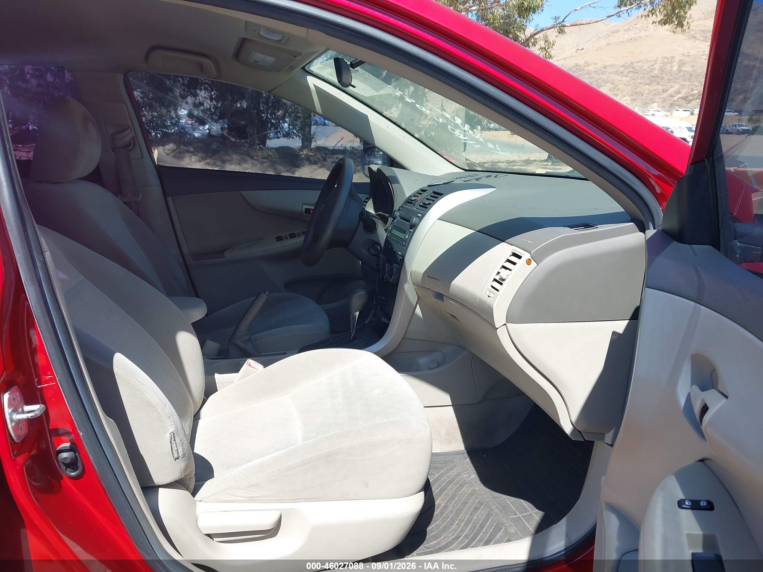 2009 Toyota Corolla Le Red vin: 1NXBU40E29Z064834