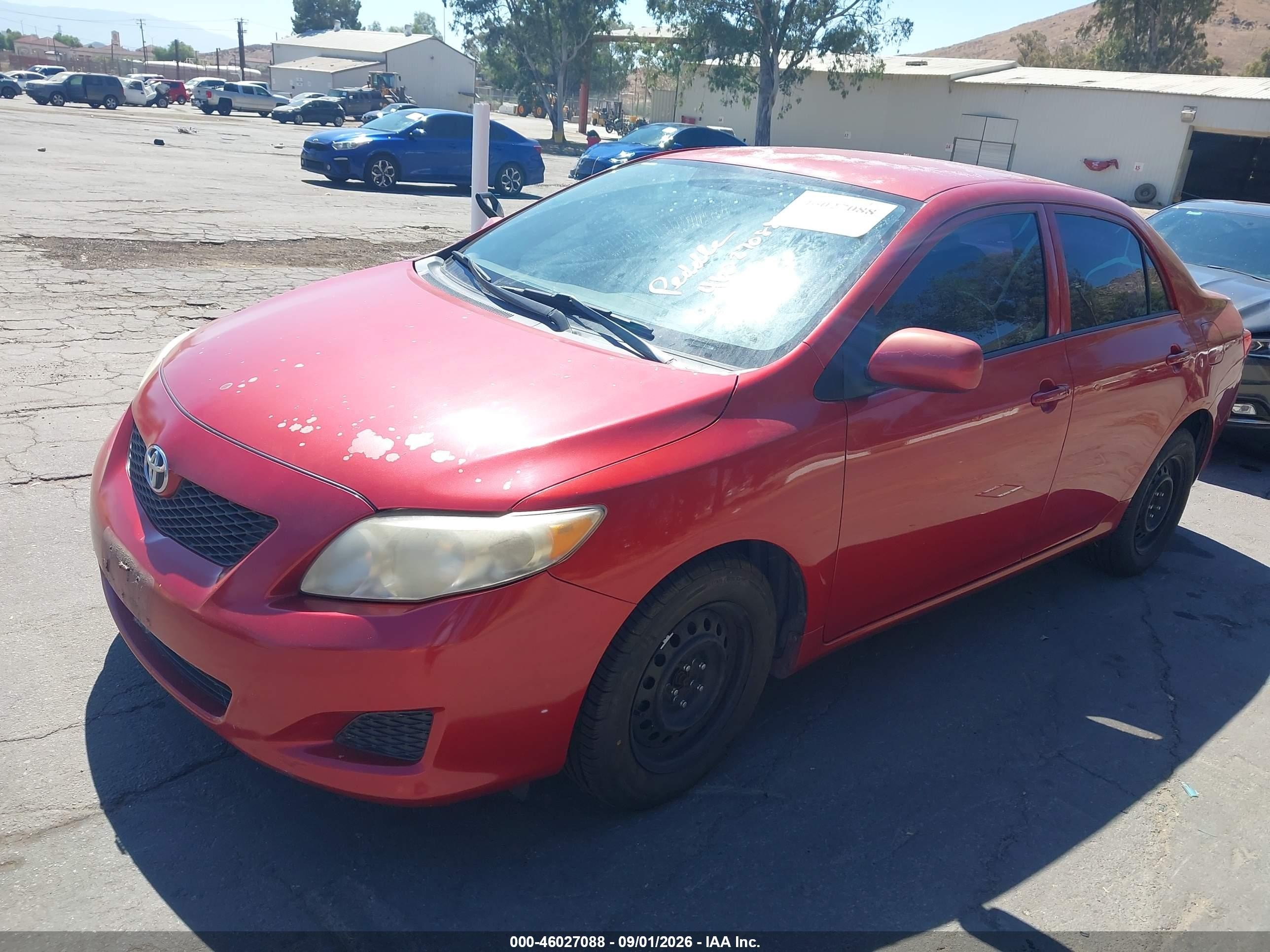 2009 Toyota Corolla Le Red vin: 1NXBU40E29Z064834