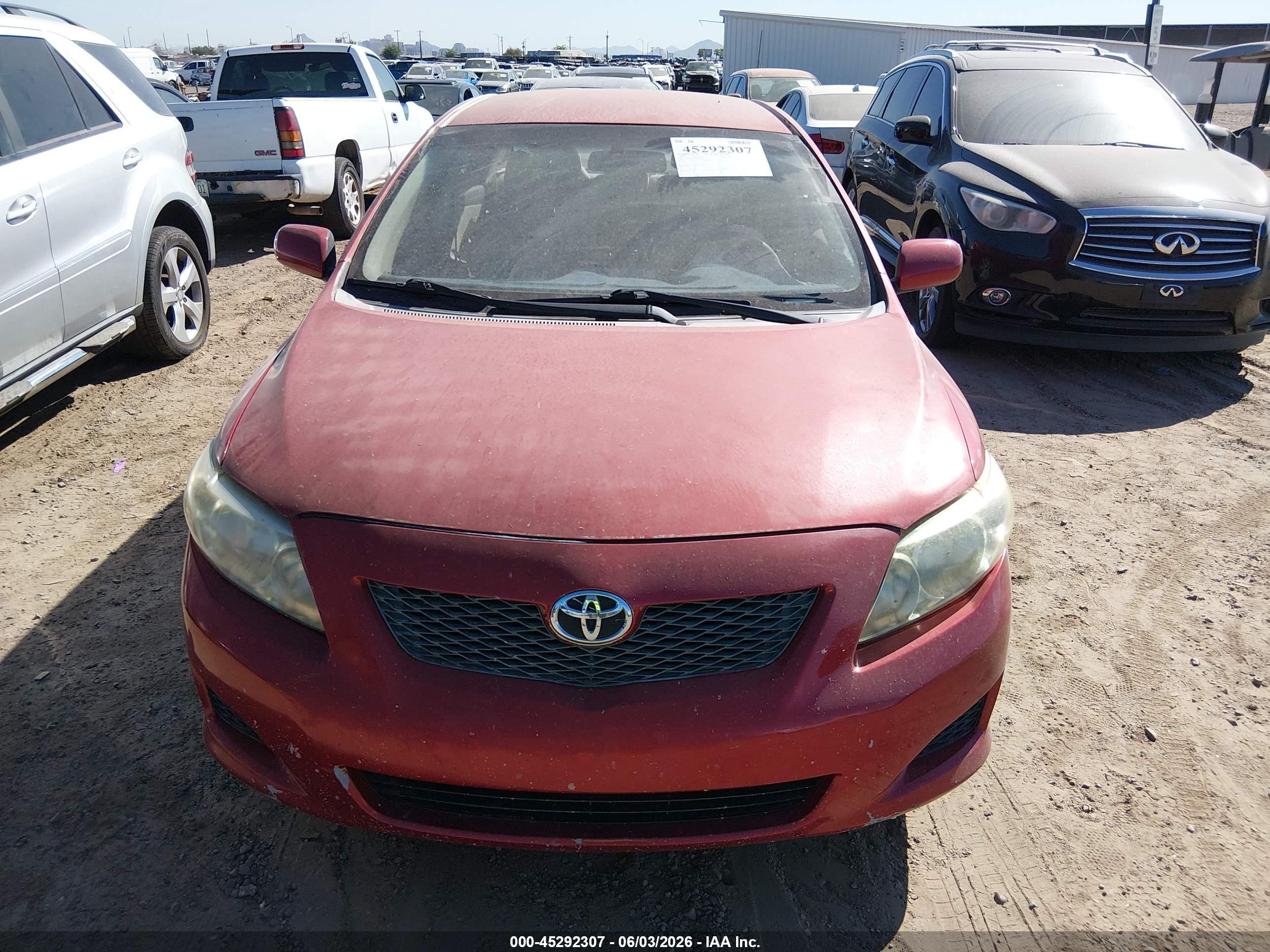 2009 Toyota Corolla Le Red vin: 1NXBU40E29Z082461