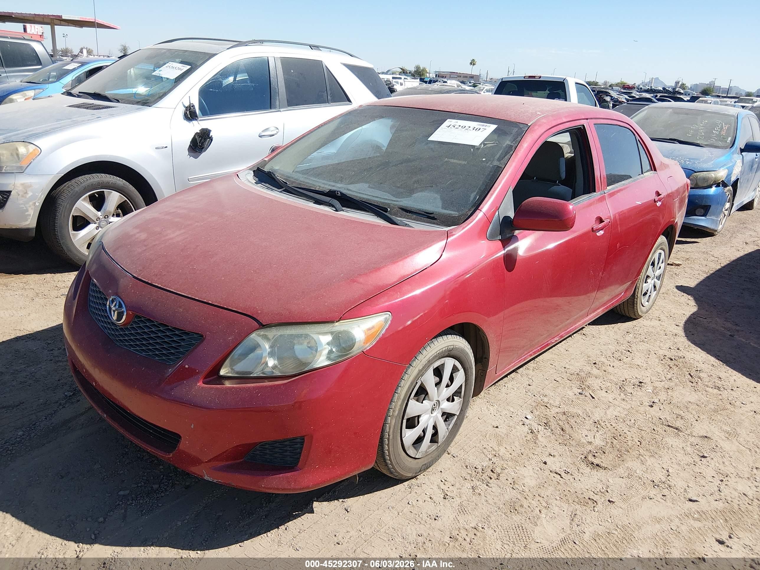 2009 Toyota Corolla Le Red vin: 1NXBU40E29Z082461