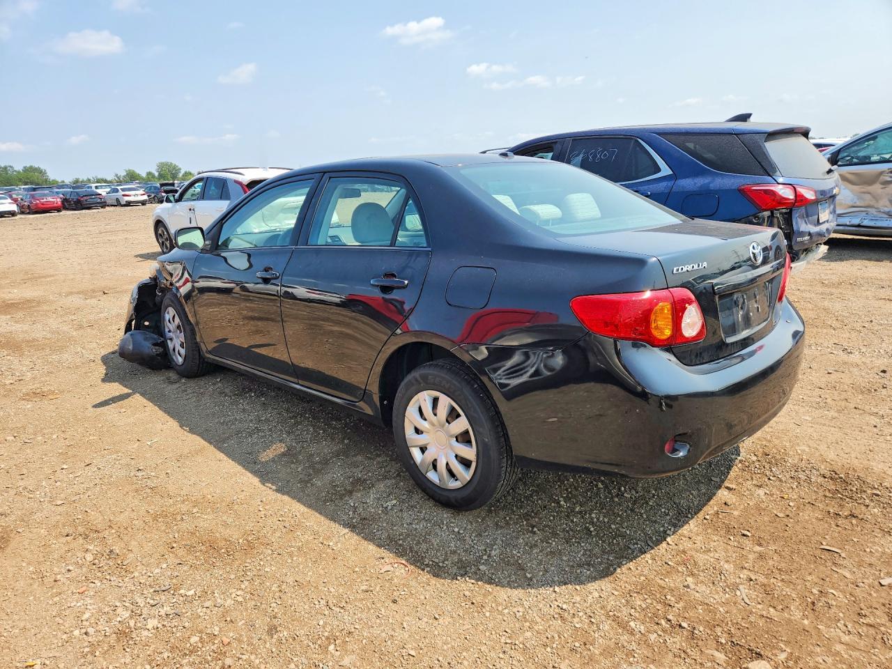 2009 Toyota Corolla Le Black vin: 1NXBU40E29Z102322