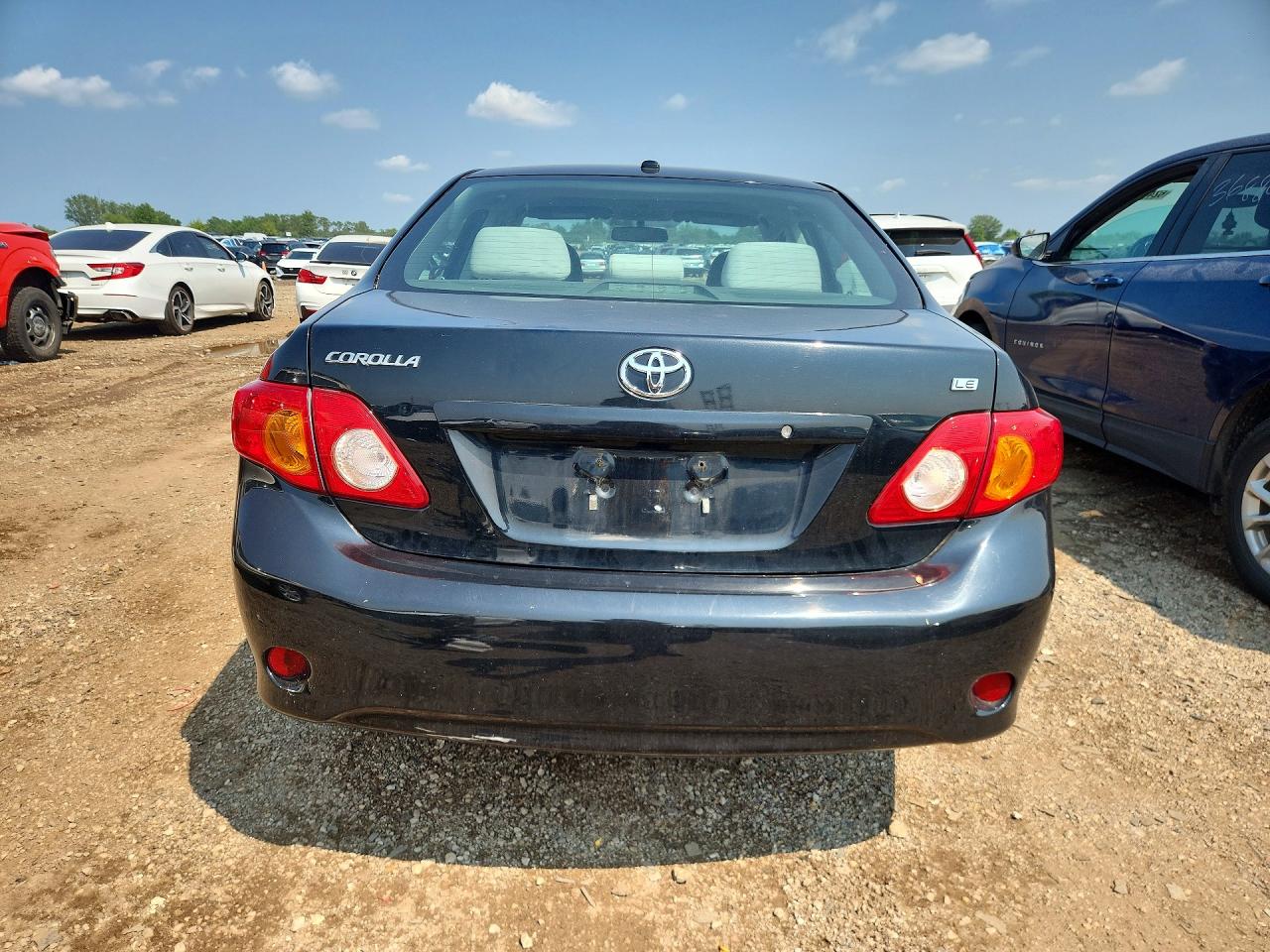 2009 Toyota Corolla Le Black vin: 1NXBU40E29Z102322