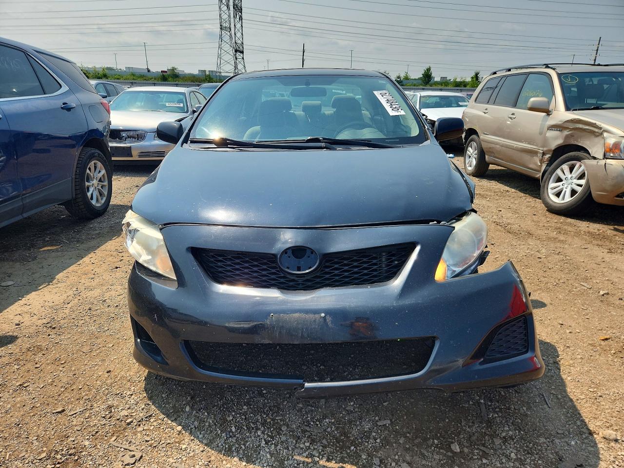 2009 Toyota Corolla Le Black vin: 1NXBU40E29Z102322