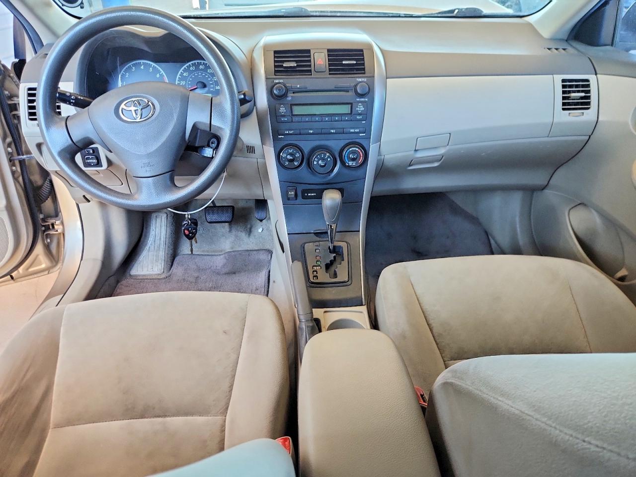 2009 Toyota Corolla Le Gold vin: 1NXBU40E39Z079276