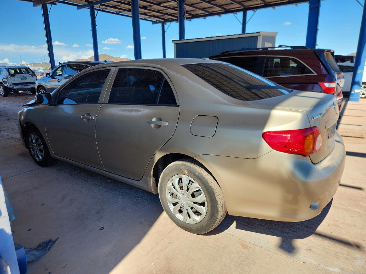 2009 Toyota Corolla Le Gold vin: 1NXBU40E39Z079276