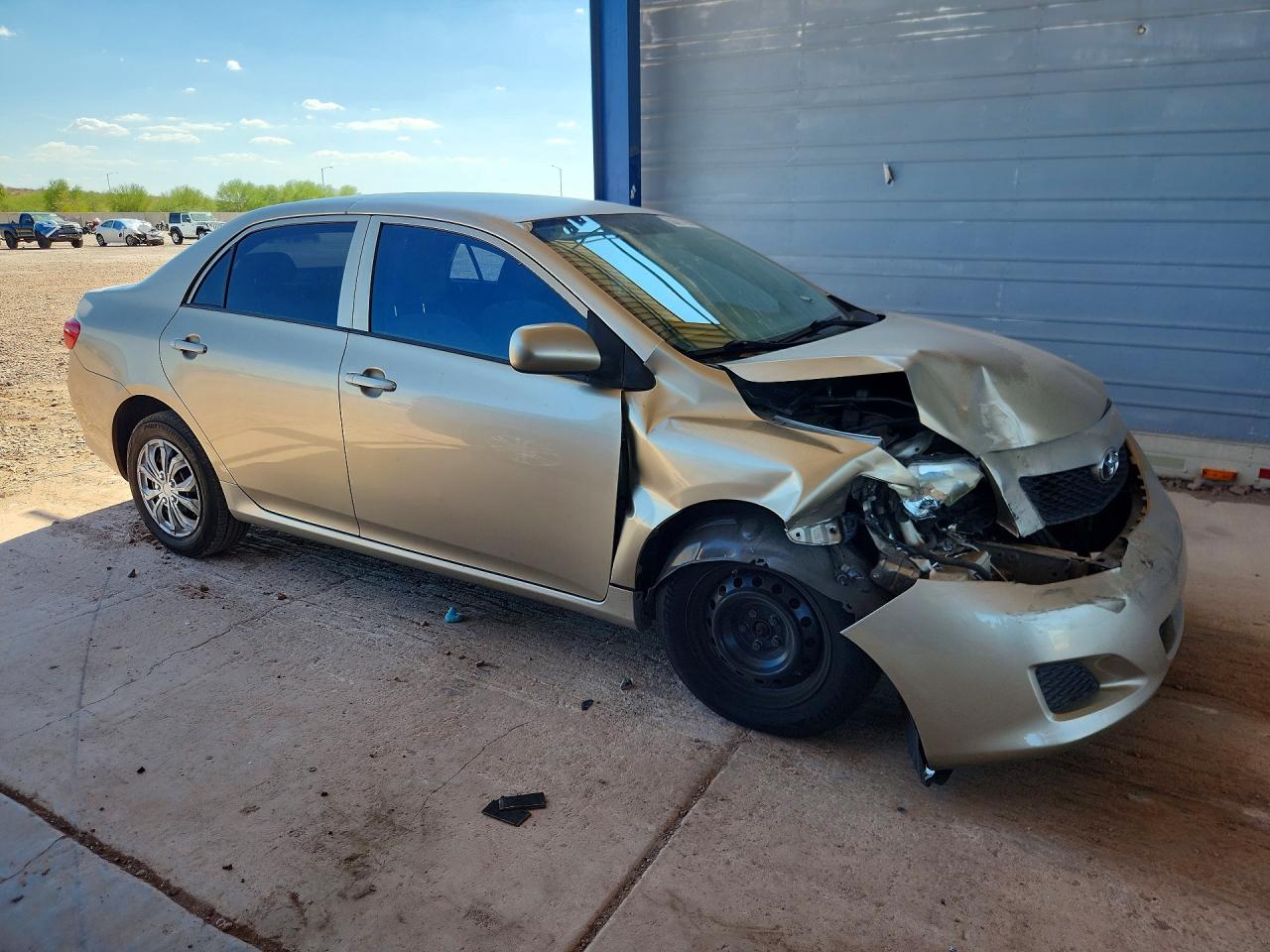 2009 Toyota Corolla Le Gold vin: 1NXBU40E39Z079276
