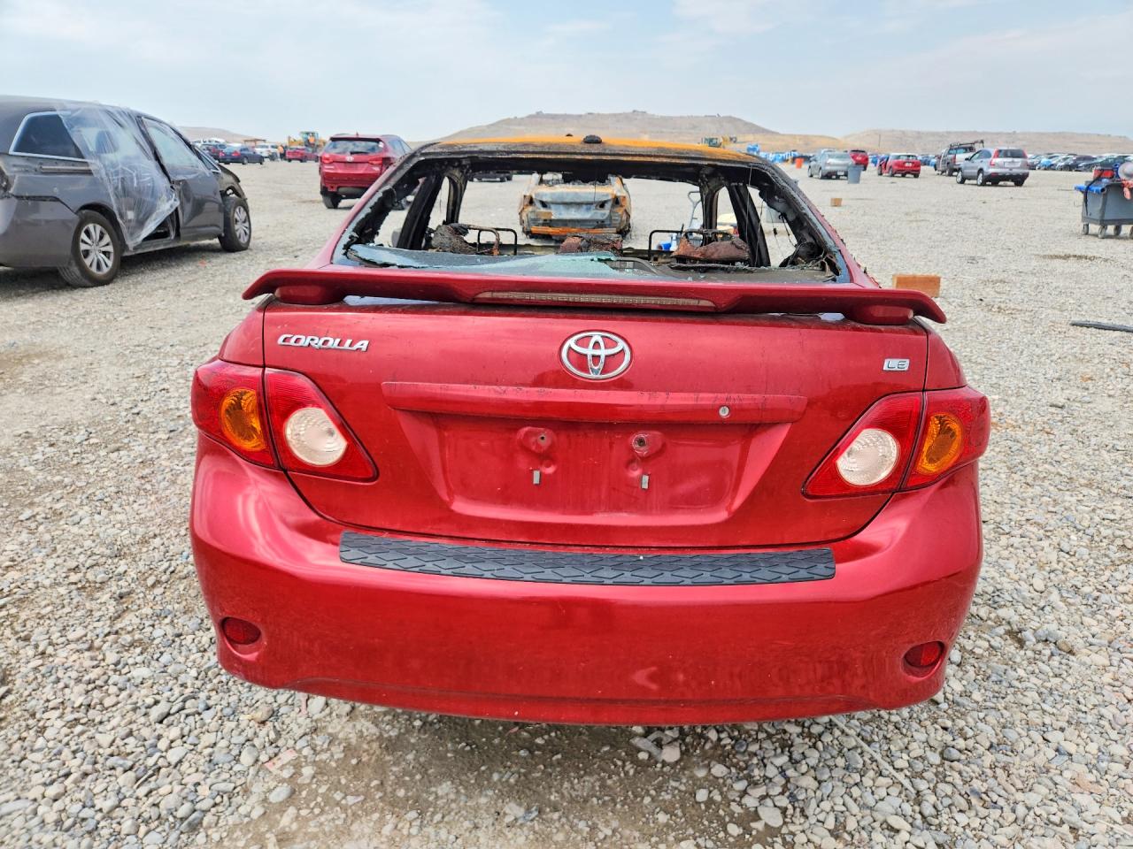 2009 Toyota Corolla Le Красный vin: 1NXBU40E39Z089015