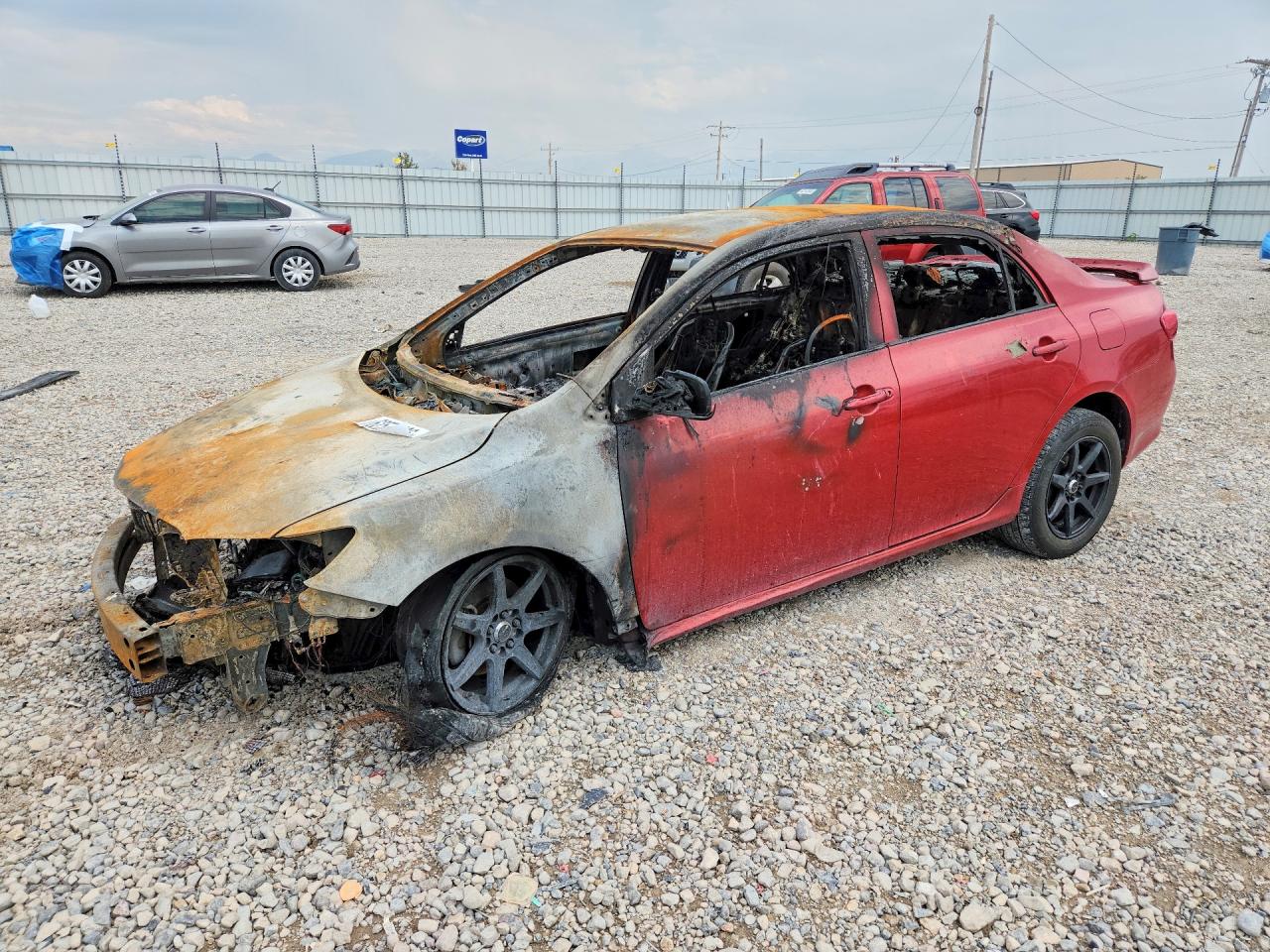 2009 Toyota Corolla Le Red vin: 1NXBU40E39Z089015