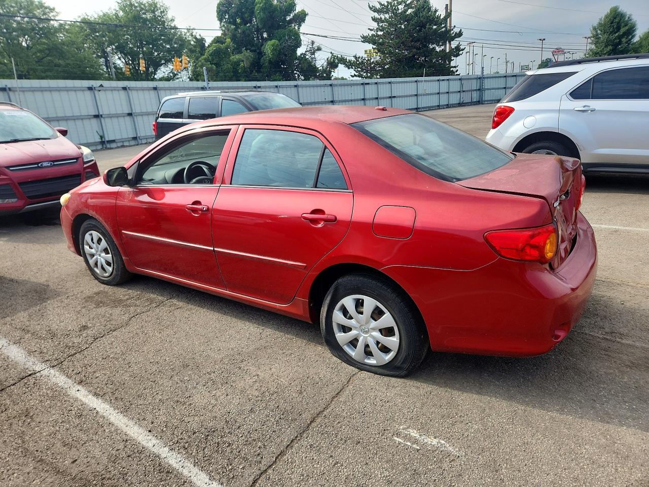 2009 Toyota Corolla Le Red vin: 1NXBU40E39Z139508