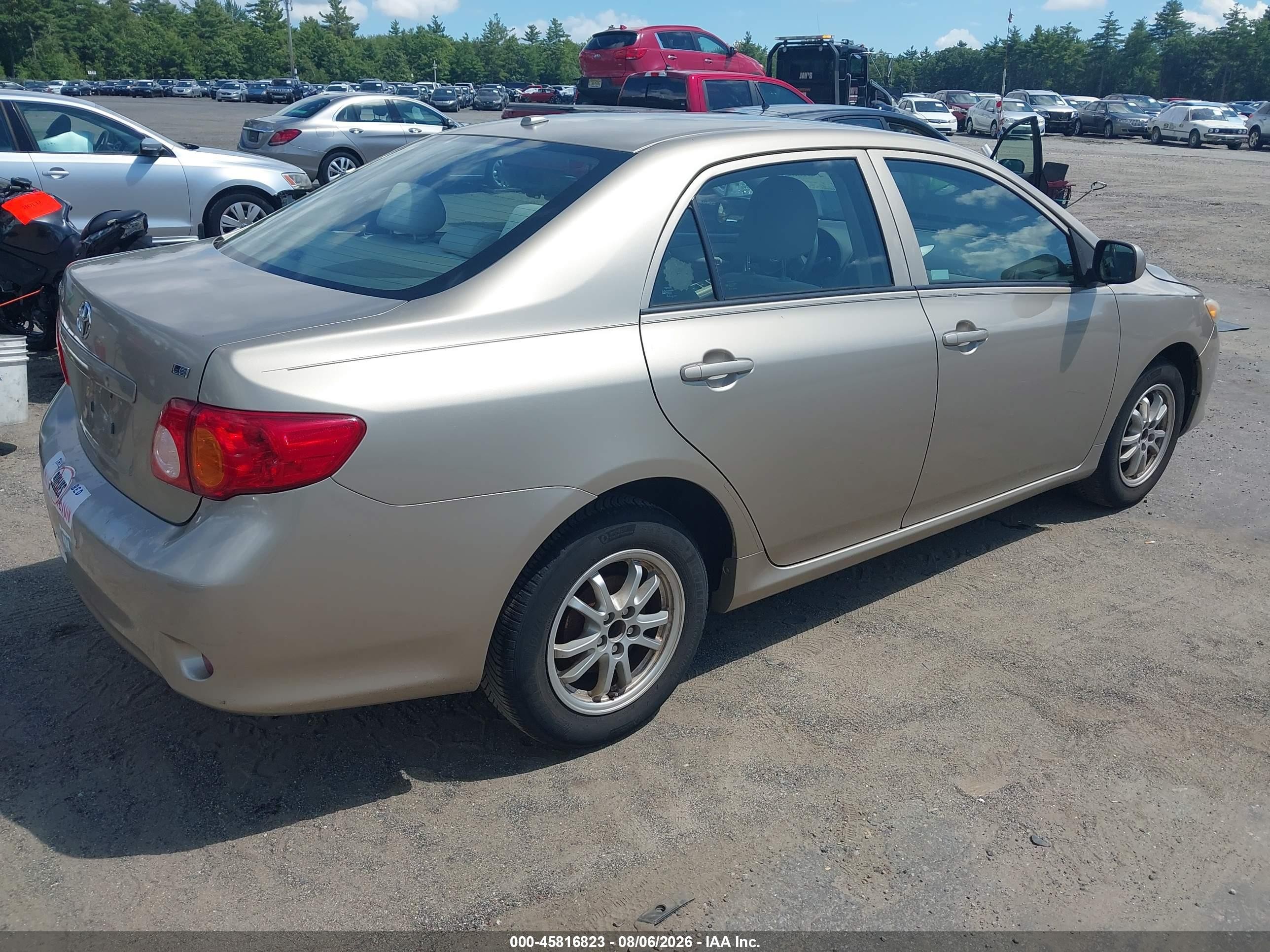 2009 Toyota Corolla Le Gold vin: 1NXBU40E39Z143607