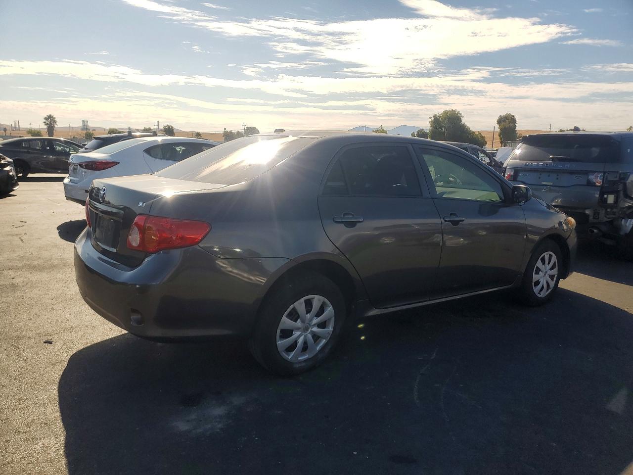 2009 Toyota Corolla Le Gray vin: 1NXBU40E39Z146801