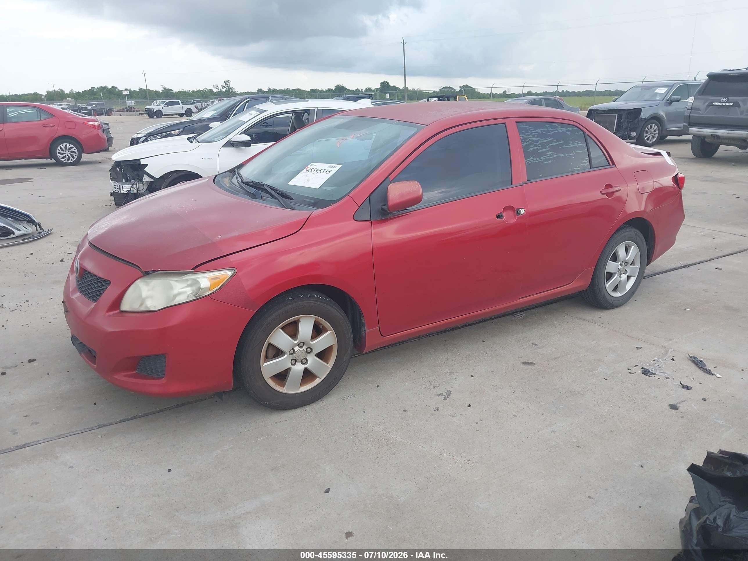 2009 Toyota Corolla Le Red vin: 1NXBU40E39Z157460