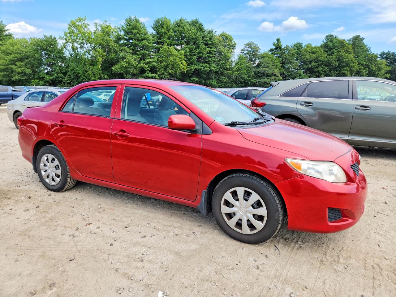 2009 Toyota Corolla Le Red vin: 1NXBU40E49Z022147
