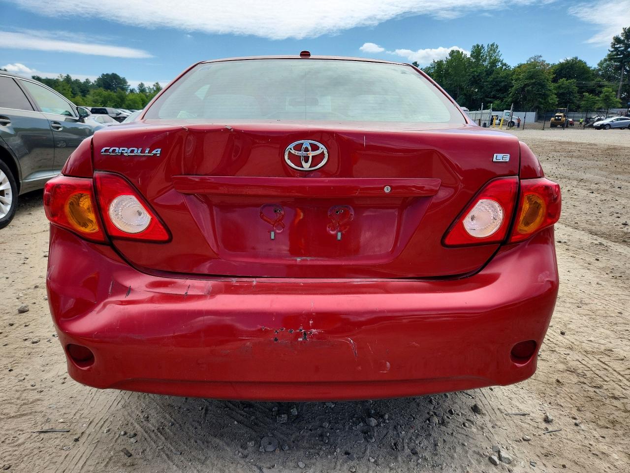 2009 Toyota Corolla Le Red vin: 1NXBU40E49Z022147