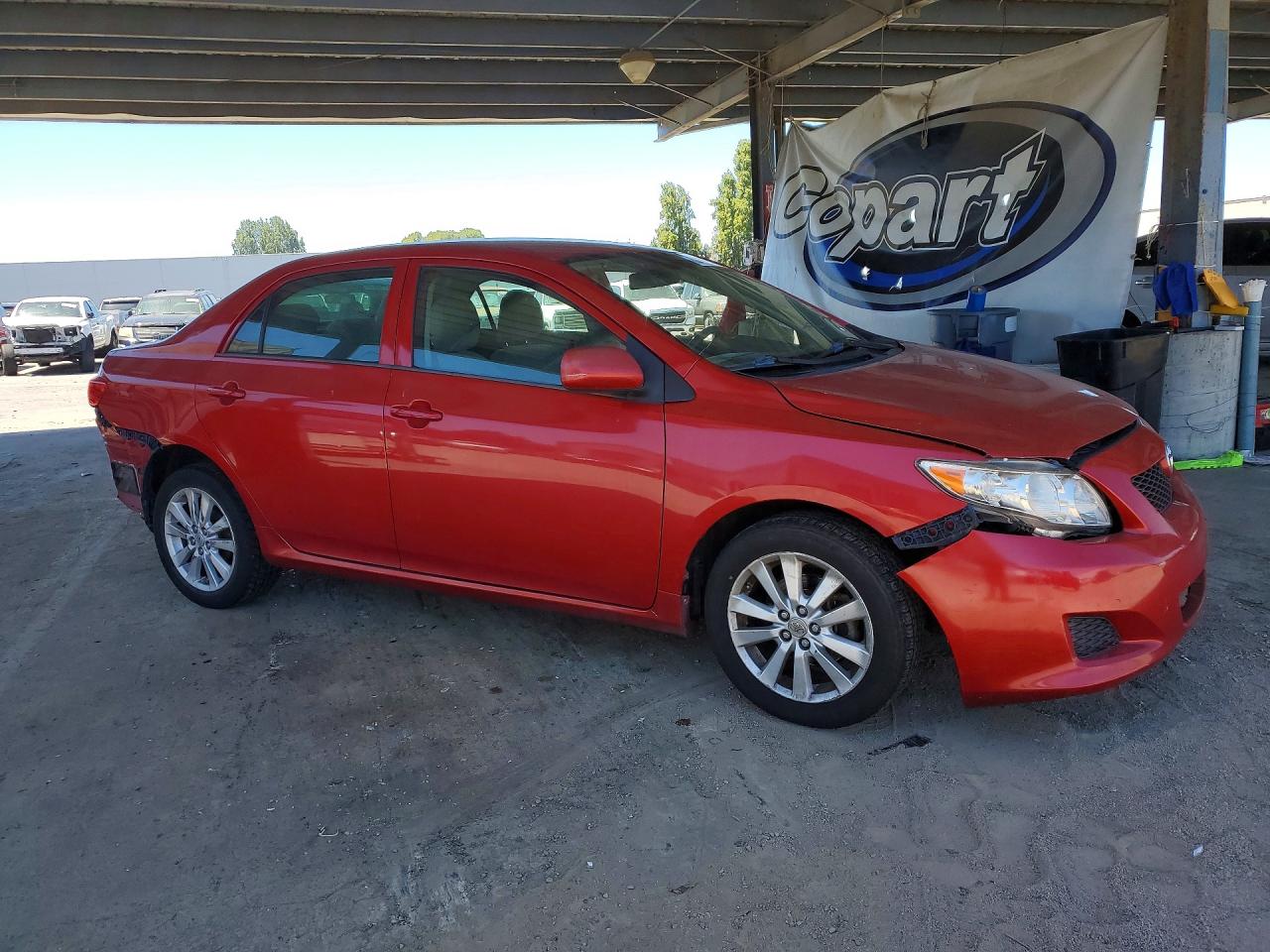 2009 Toyota Corolla Le Burgundy vin: 1NXBU40E49Z055844