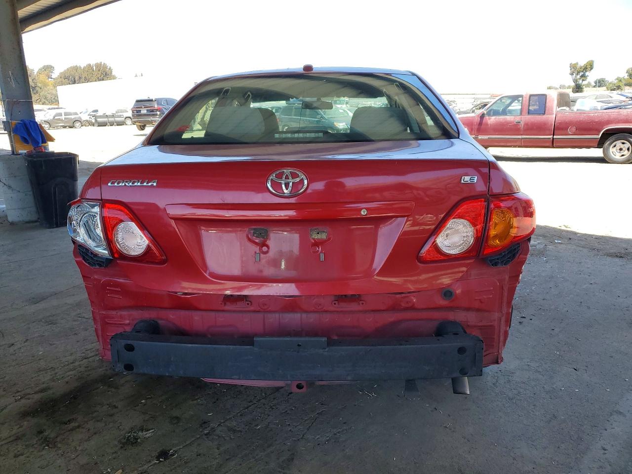 2009 Toyota Corolla Le Burgundy vin: 1NXBU40E49Z055844