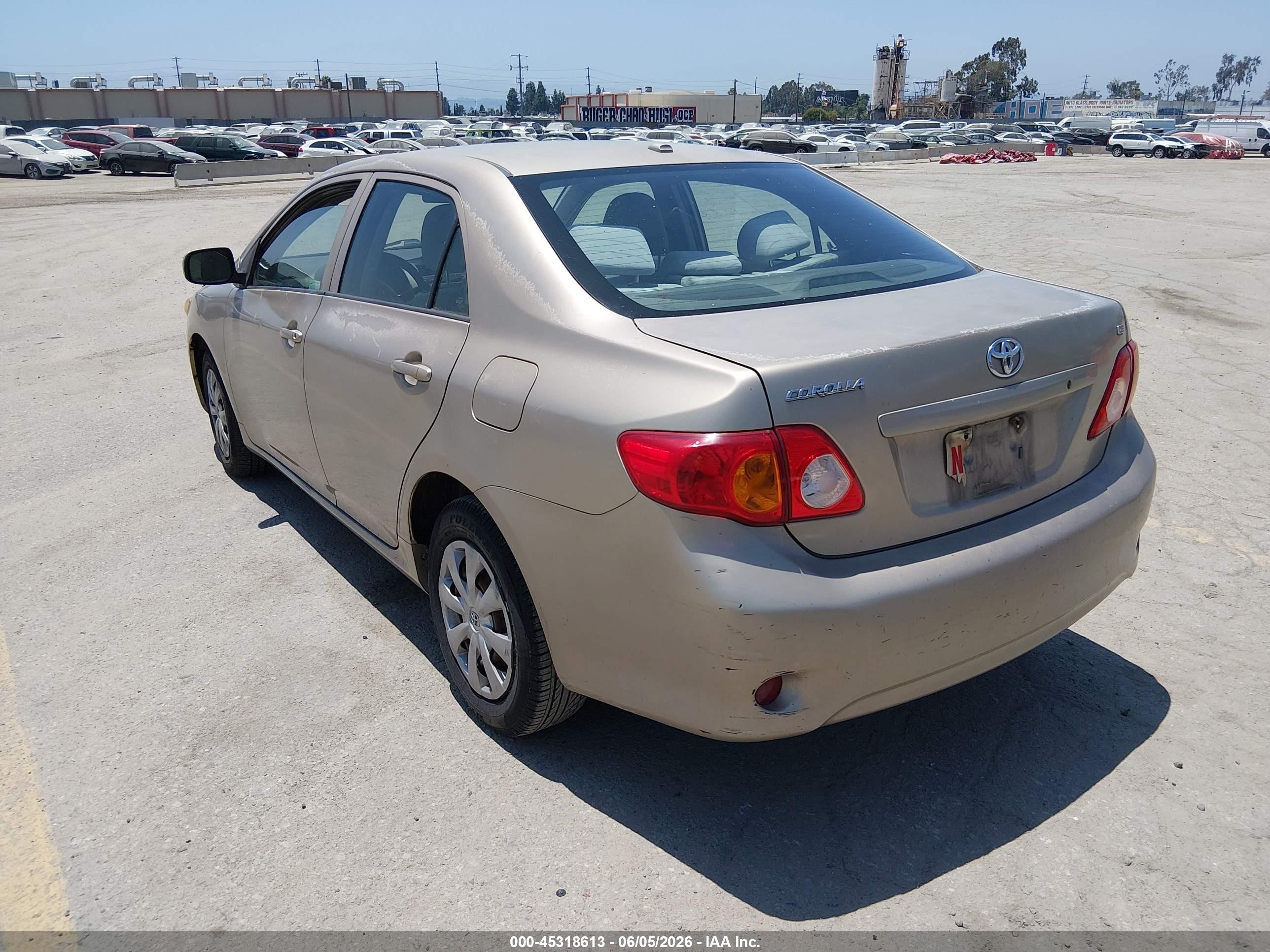 2009 Toyota Corolla Le Золотой vin: 1NXBU40E49Z063488