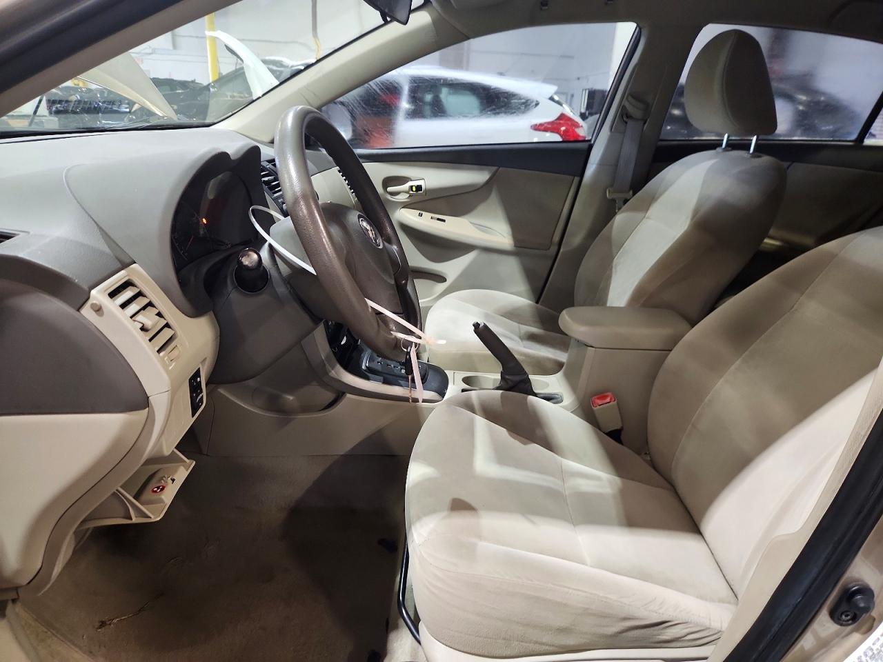 2009 Toyota Corolla Le Золотой vin: 1NXBU40E49Z090125
