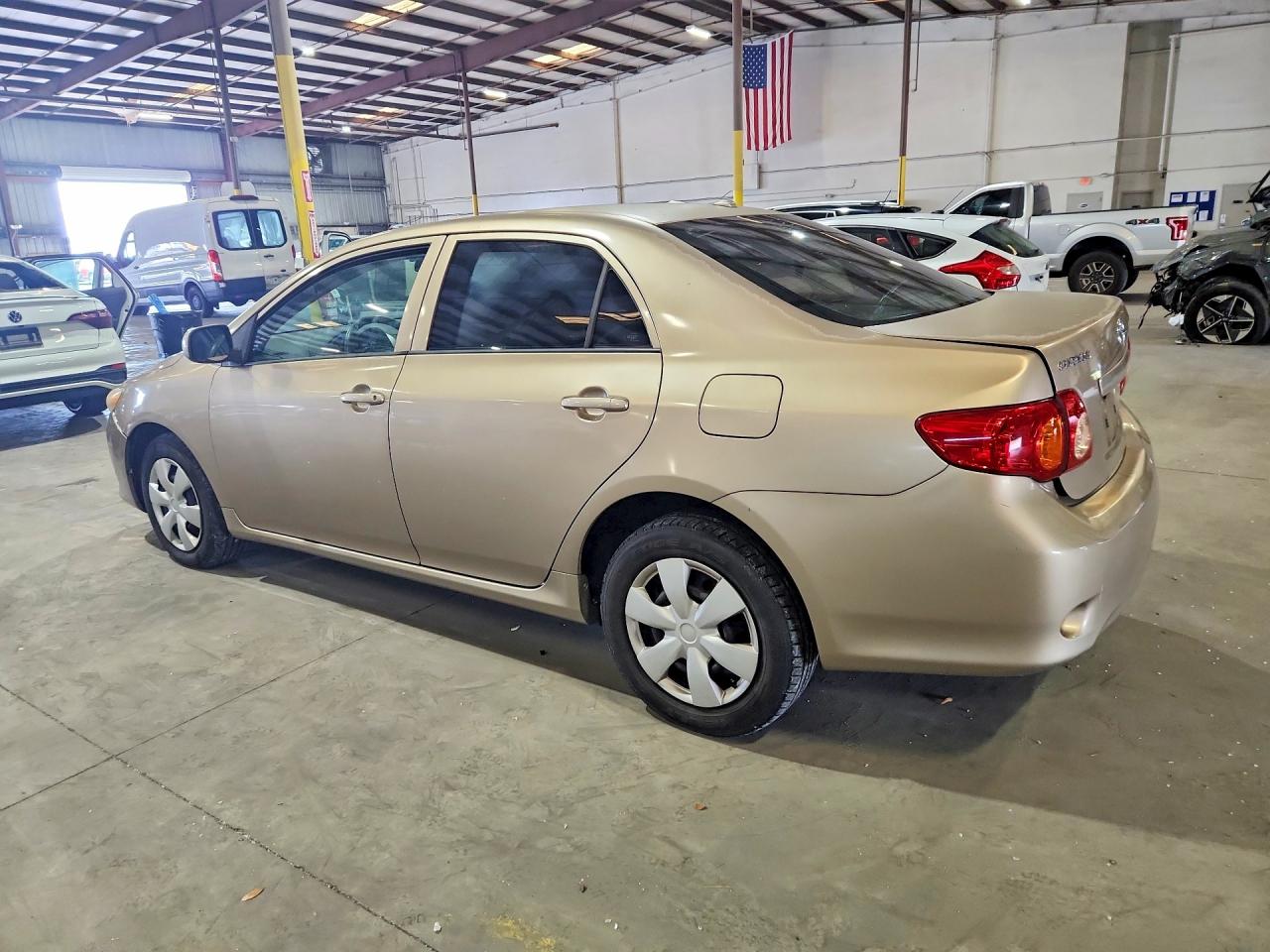 2009 Toyota Corolla Le Золотой vin: 1NXBU40E49Z090125