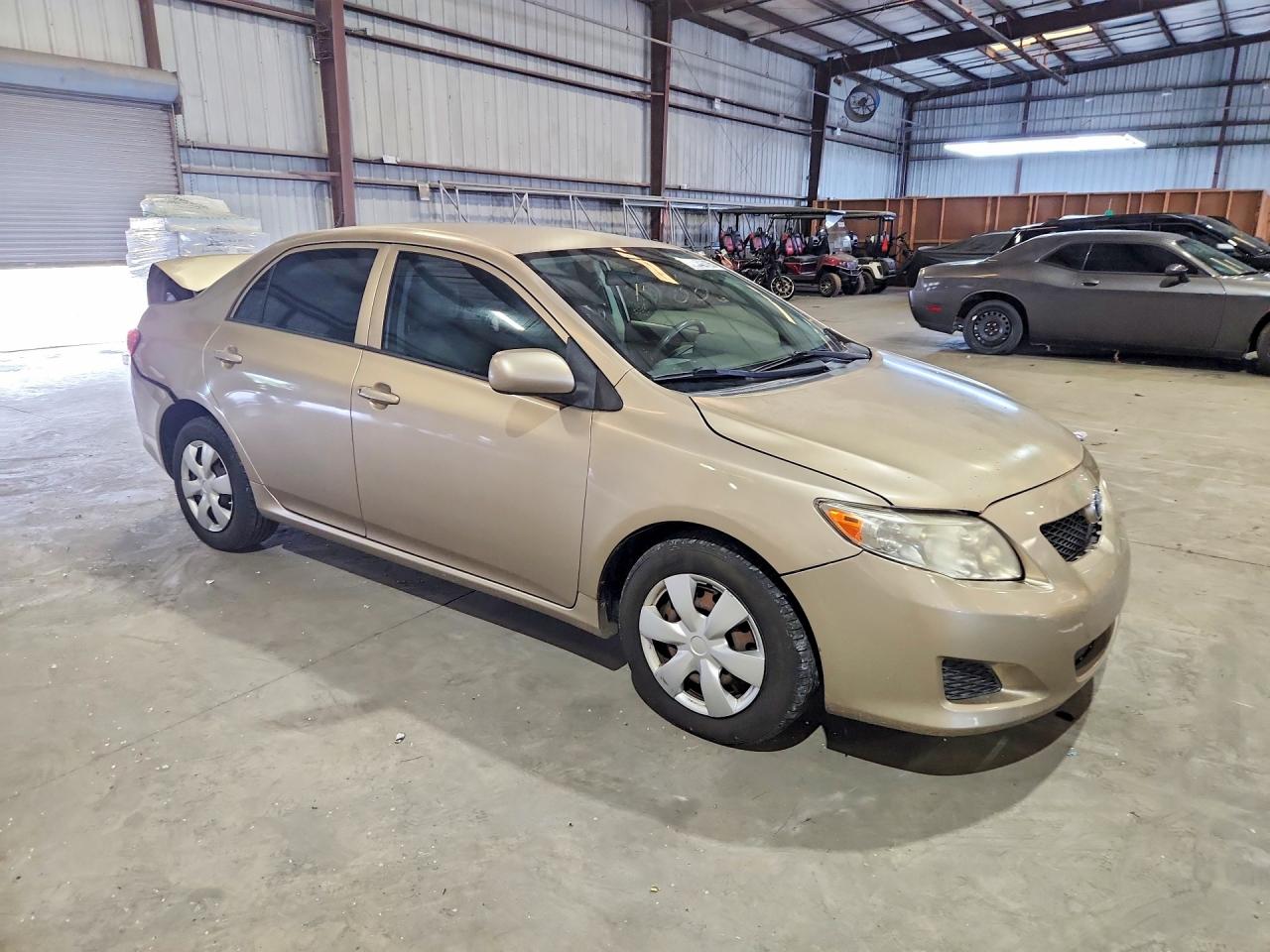 2009 Toyota Corolla Le Золотой vin: 1NXBU40E49Z090125
