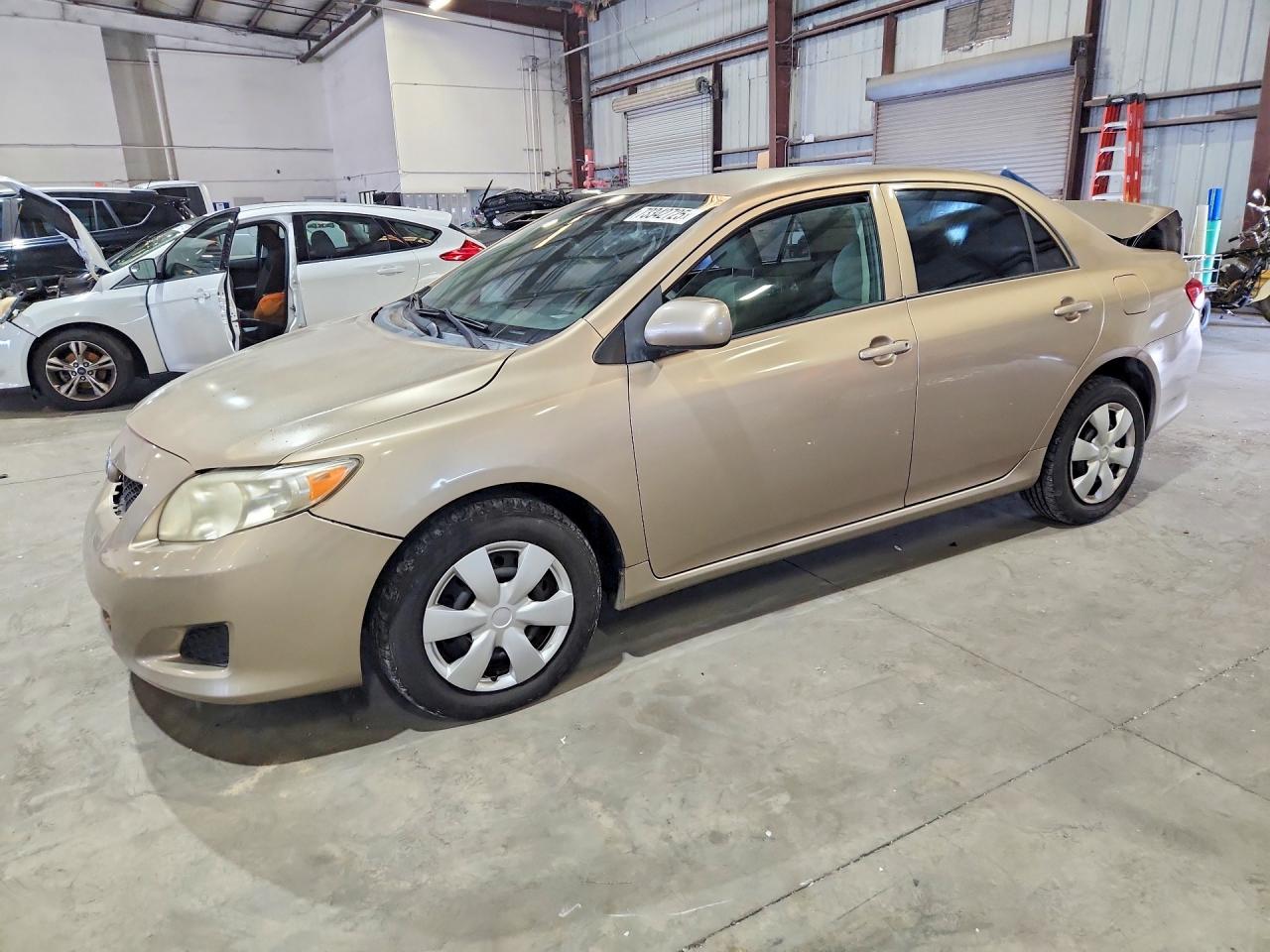 2009 Toyota Corolla Le Gold vin: 1NXBU40E49Z090125