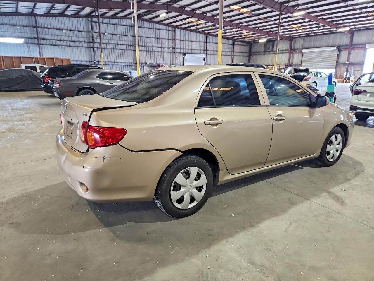 2009 Toyota Corolla Le Золотой vin: 1NXBU40E49Z090125