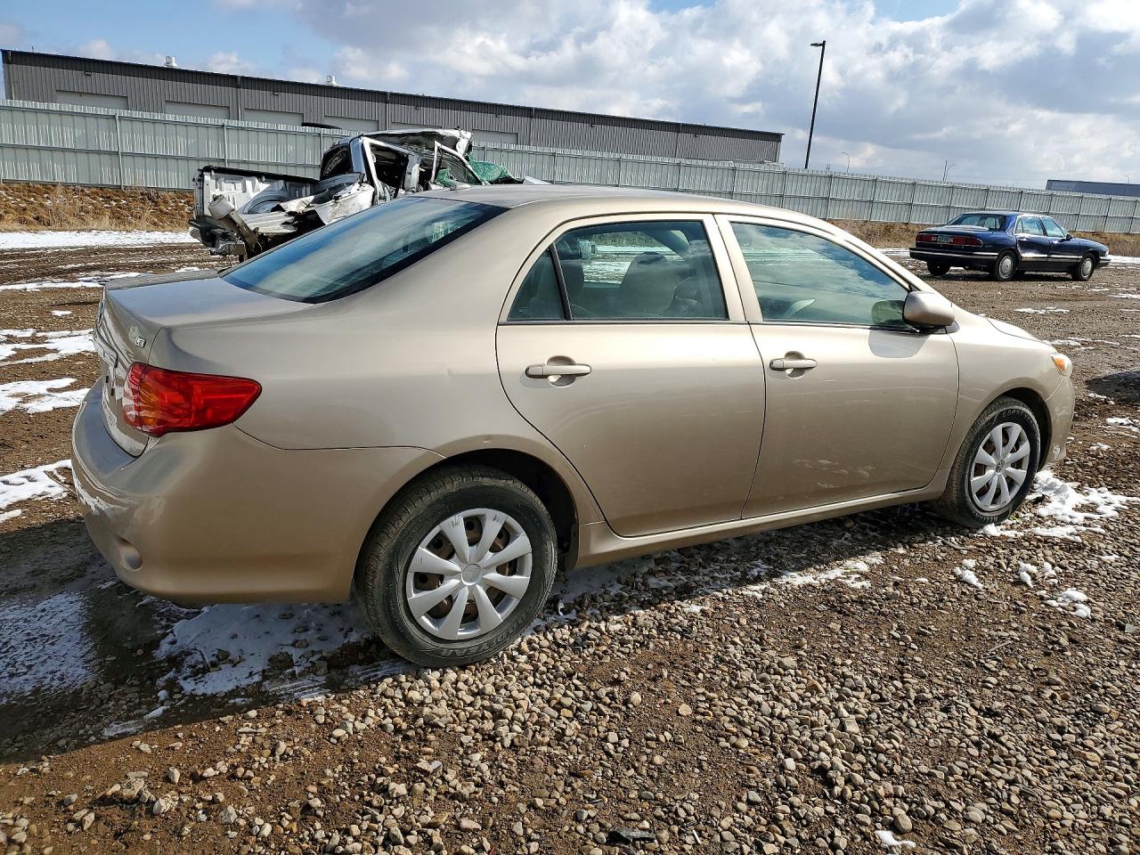 2009 Toyota Corolla Base Beige vin: 1NXBU40E49Z109451